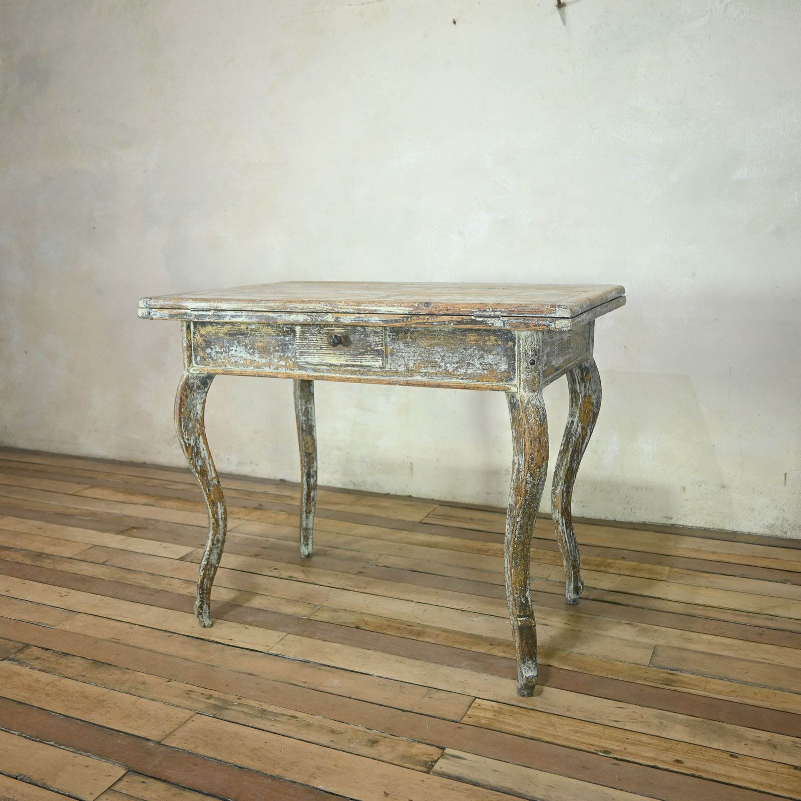 Furniture A 19th Century French Painted Swivel Top Dining Table photo