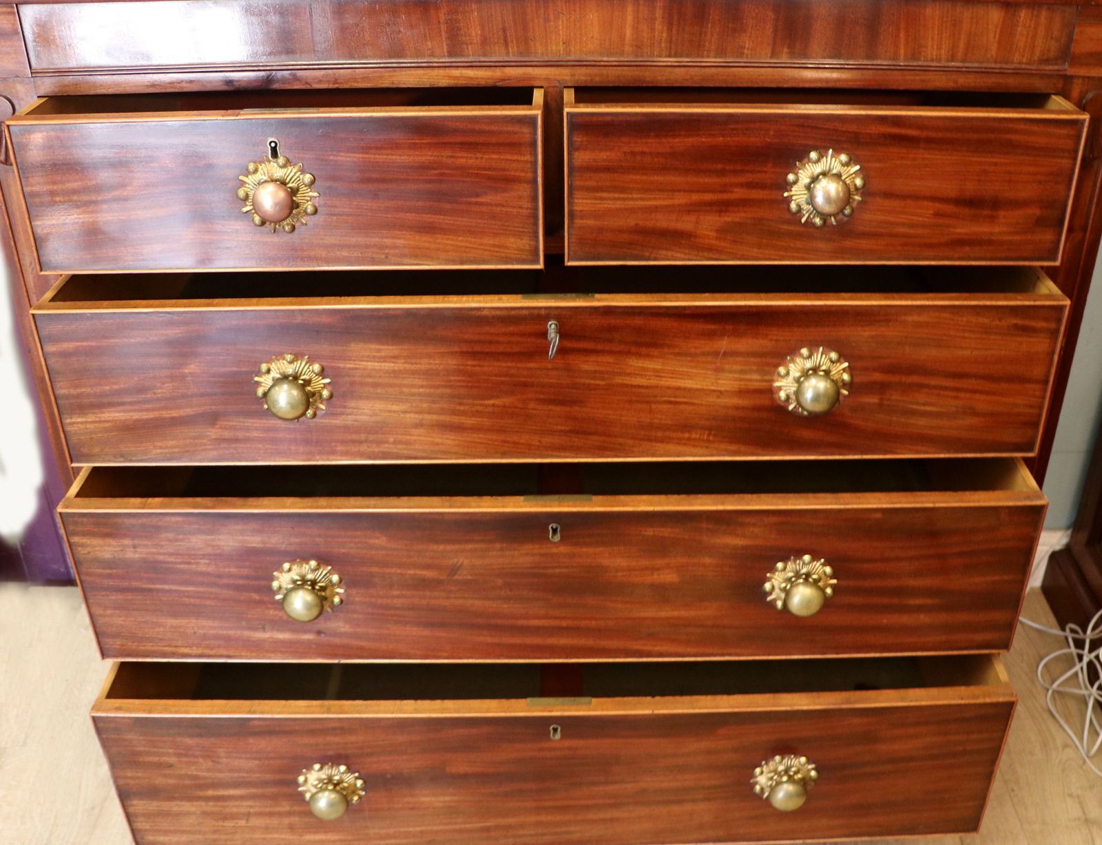 A Lovely 19th Century Flame Mahogany Chest Of Drawers. photo furniture