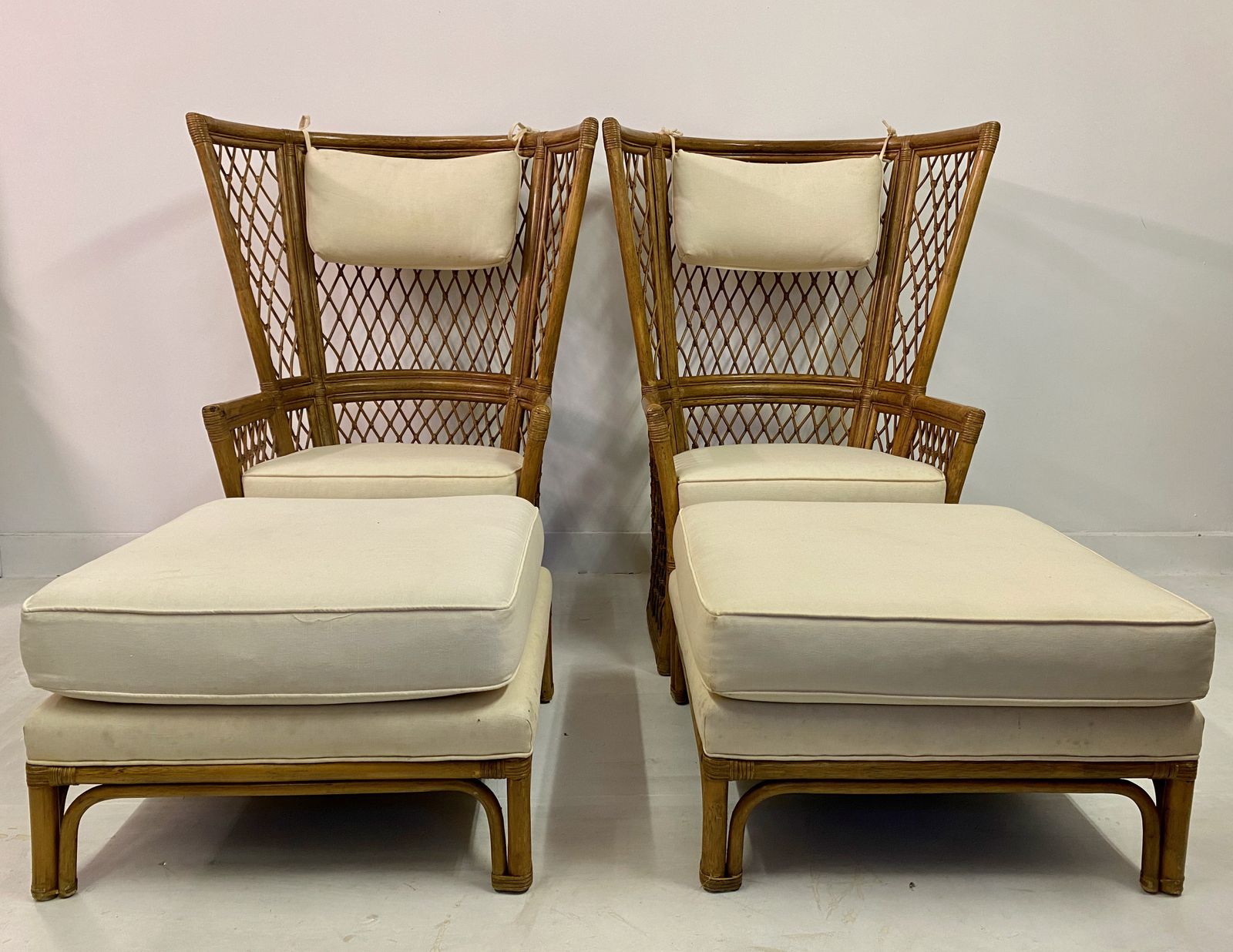 photo for sale Pair Of 1980s High Back Bamboo Chairs With Ottomans