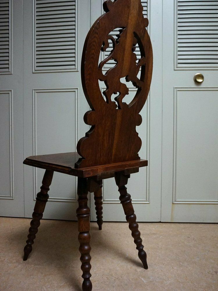 646.0 19th Century Swiss Black Forest Hand Carved Oak Side Chair With Standing Lion photo
