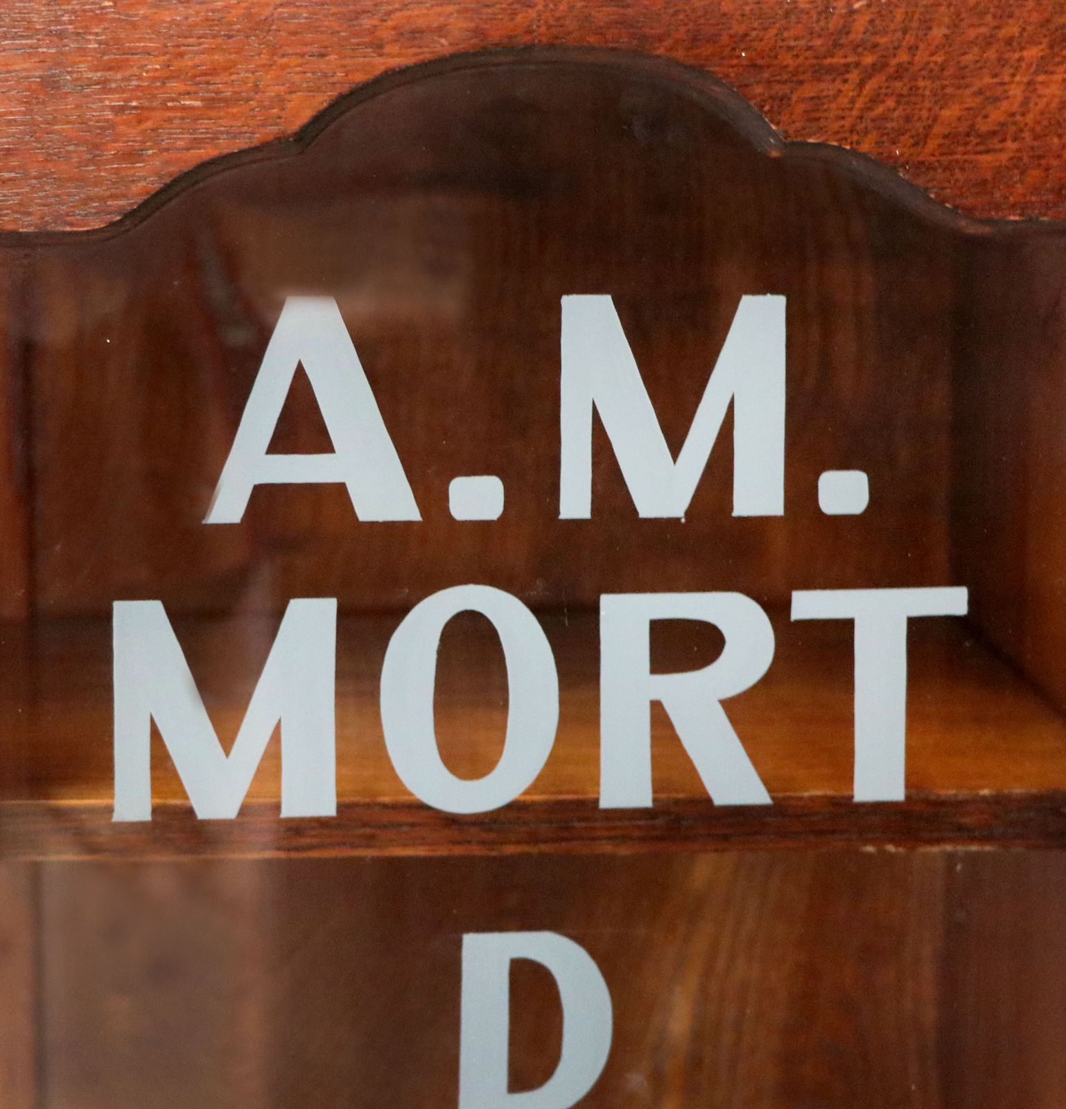 A Lovely Art Deco Styled Cabinet Sign Written With The Details Of A Funeral Directors. photo vinterior