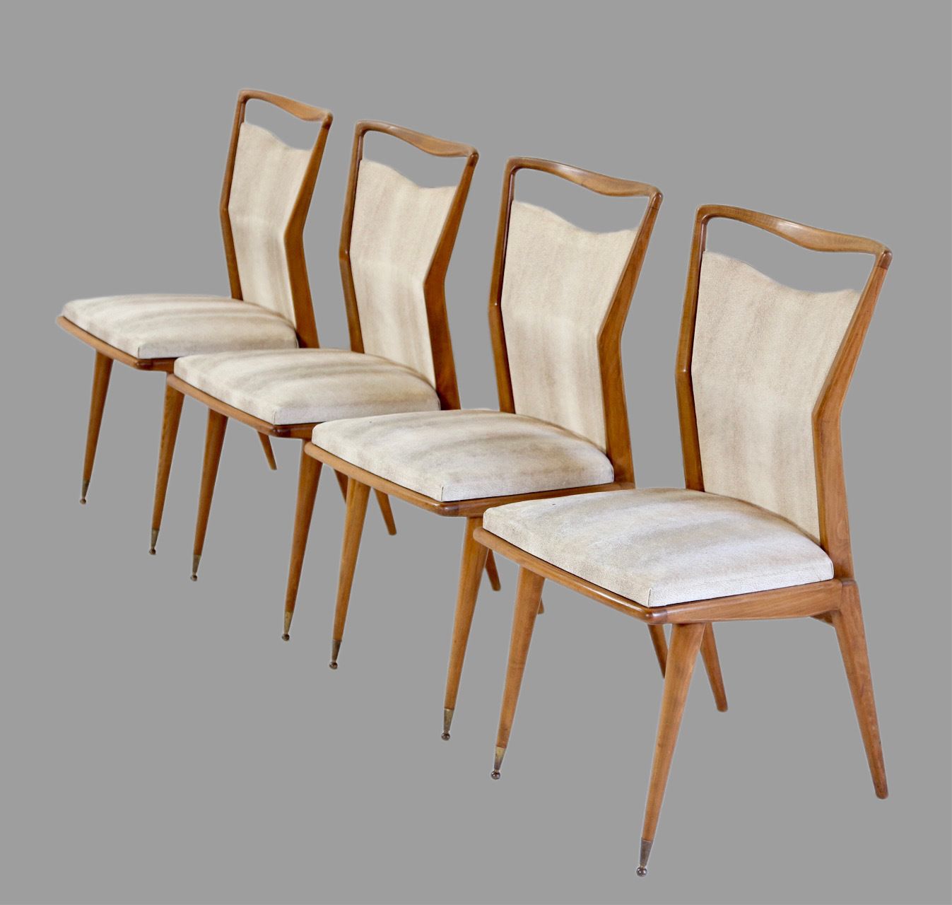Set Of 4 French Mid Century Modern Teak Dining Chairs With Sculpted Brass Sabots