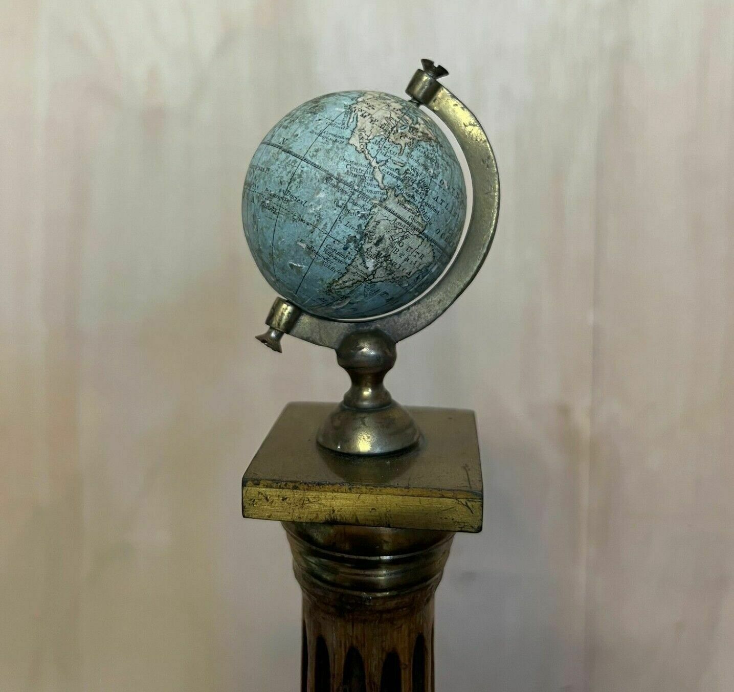 photo for sale Unique Pair Of Antique John Stone's Miniature Globes On Corinthian Pilled Bases