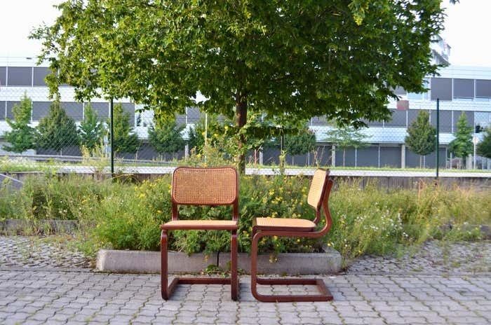 photo furniture Vintage Cane Cantilever Dining Chairs In The Manner Of Marcel Breuer Set Of 4
