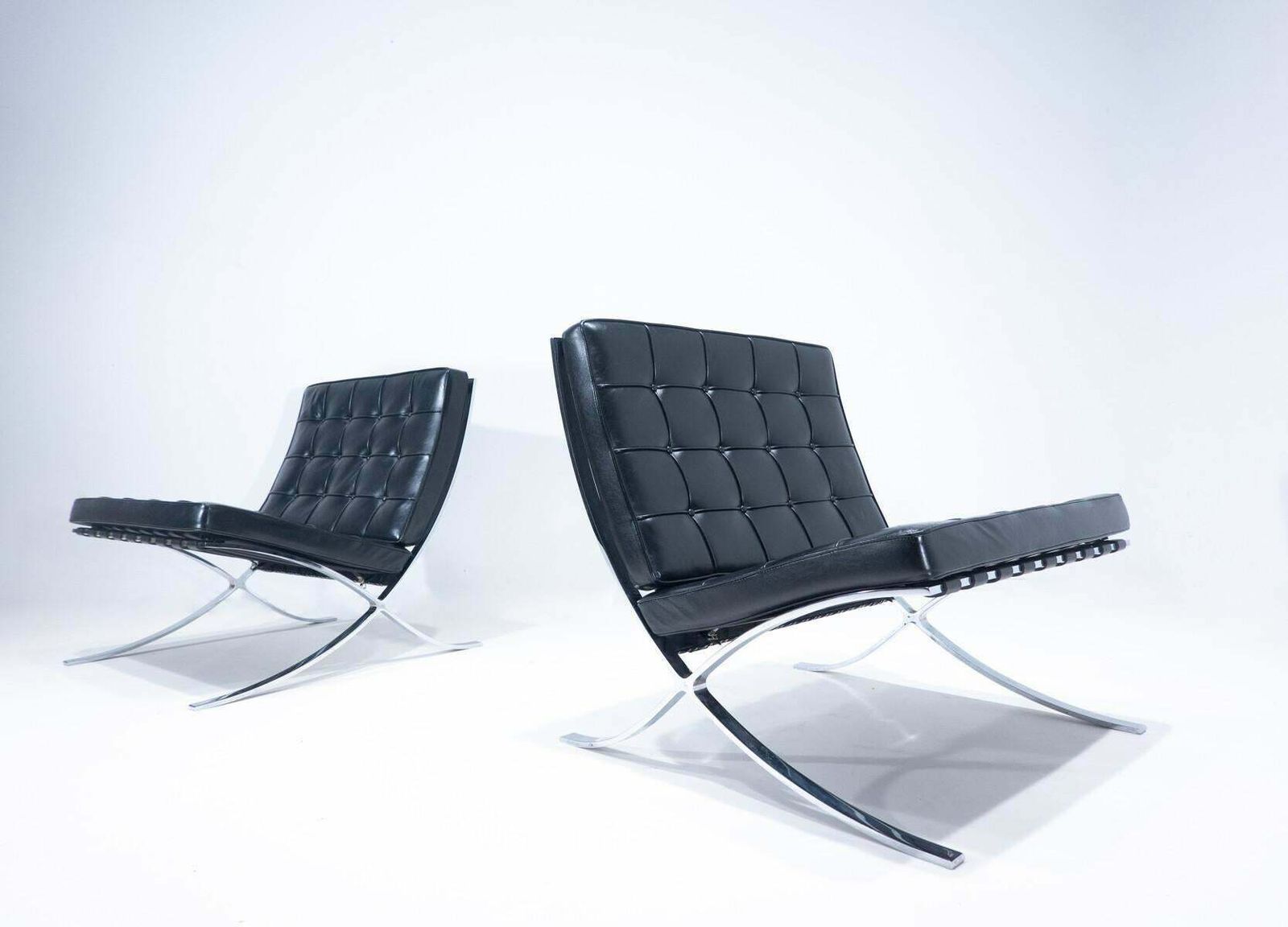 Furniture Pair Of Black Leather Barcelona Chairs By Mies Van Der Rohe For Knoll, 1960s photo