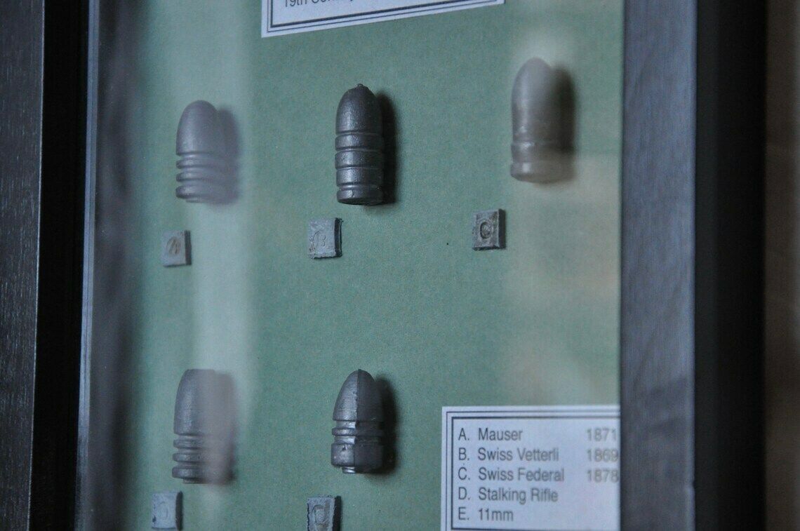 19th Century 11mm Rifle Cast Lead Bullets In Display Frame photo for sale