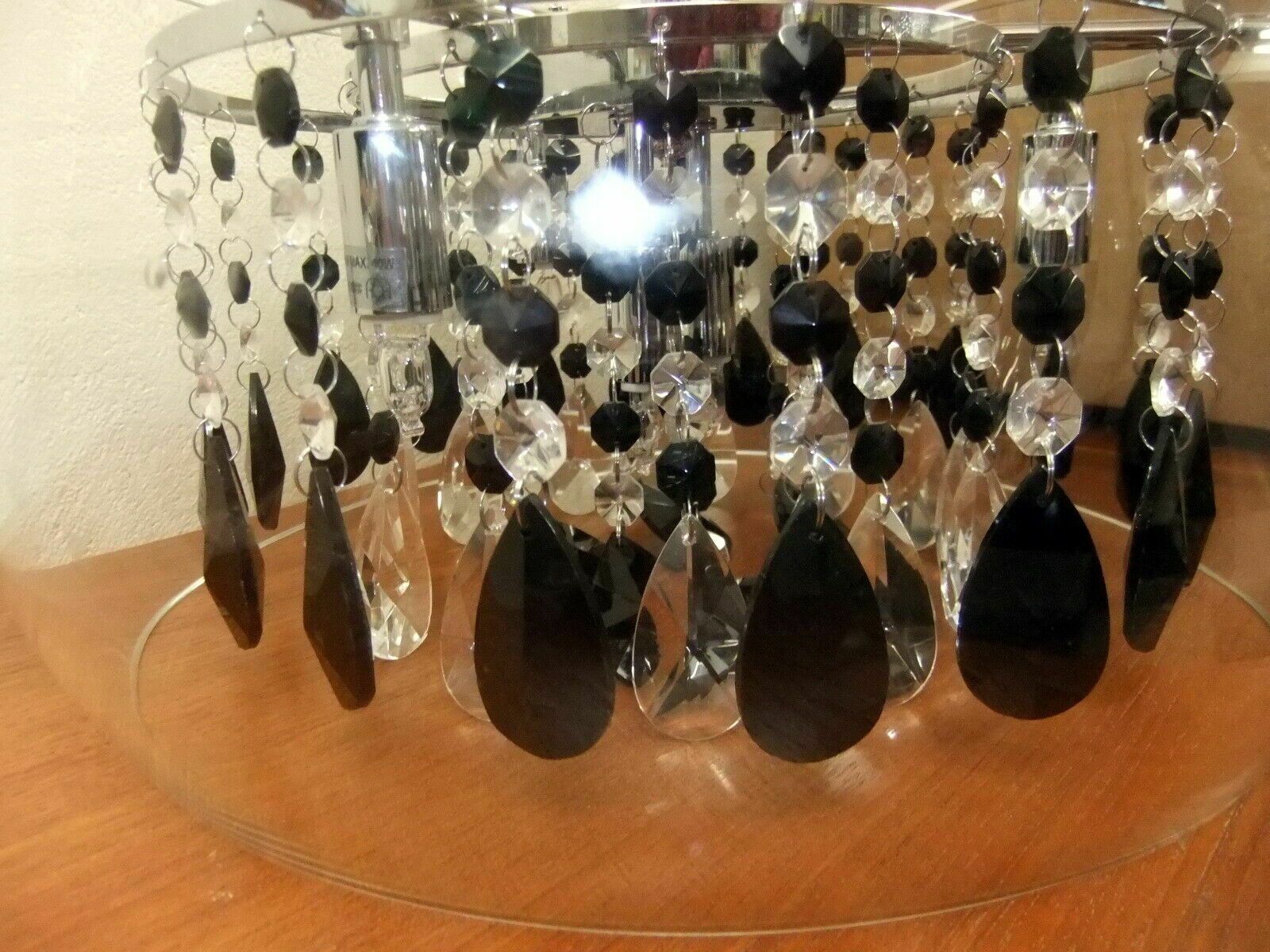 Dar Lighting Pendant Lamp. Globe Shaped With Hanging Crystal Drops. photo Lighting
