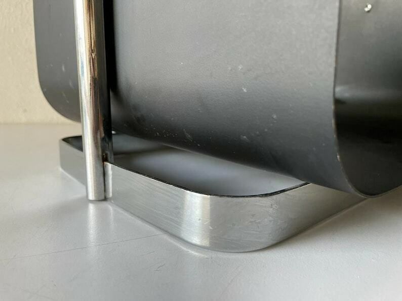 photo furniture Modernist Arc Shaped Chrome And Black Metal Magazine Stand, 1970s, Germany