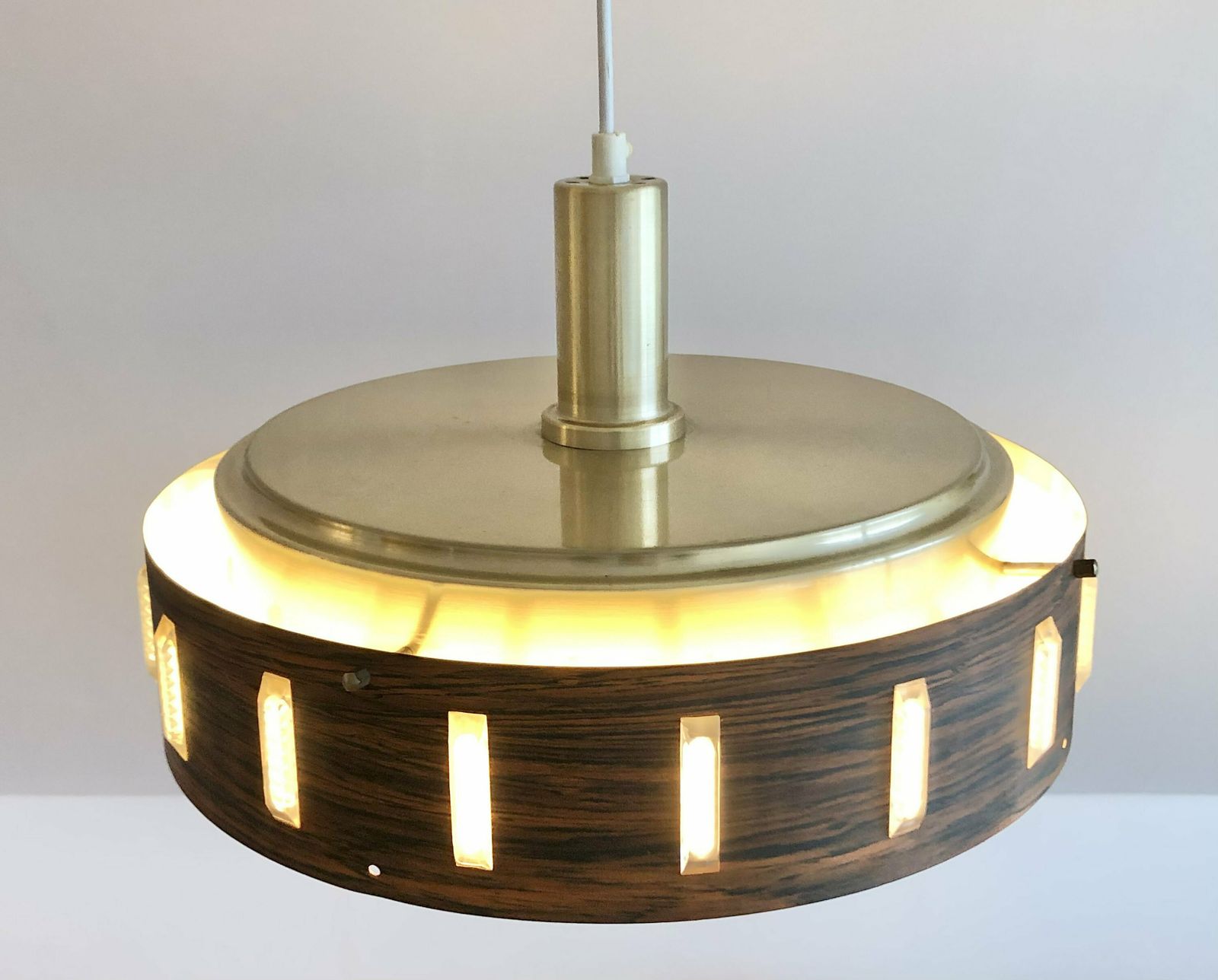 Danish Mid Century Modern Design Ceiling Lamp With Gold Painted Metal Shade And Cool Circular Painted Wood Patterned Shade photo for sale