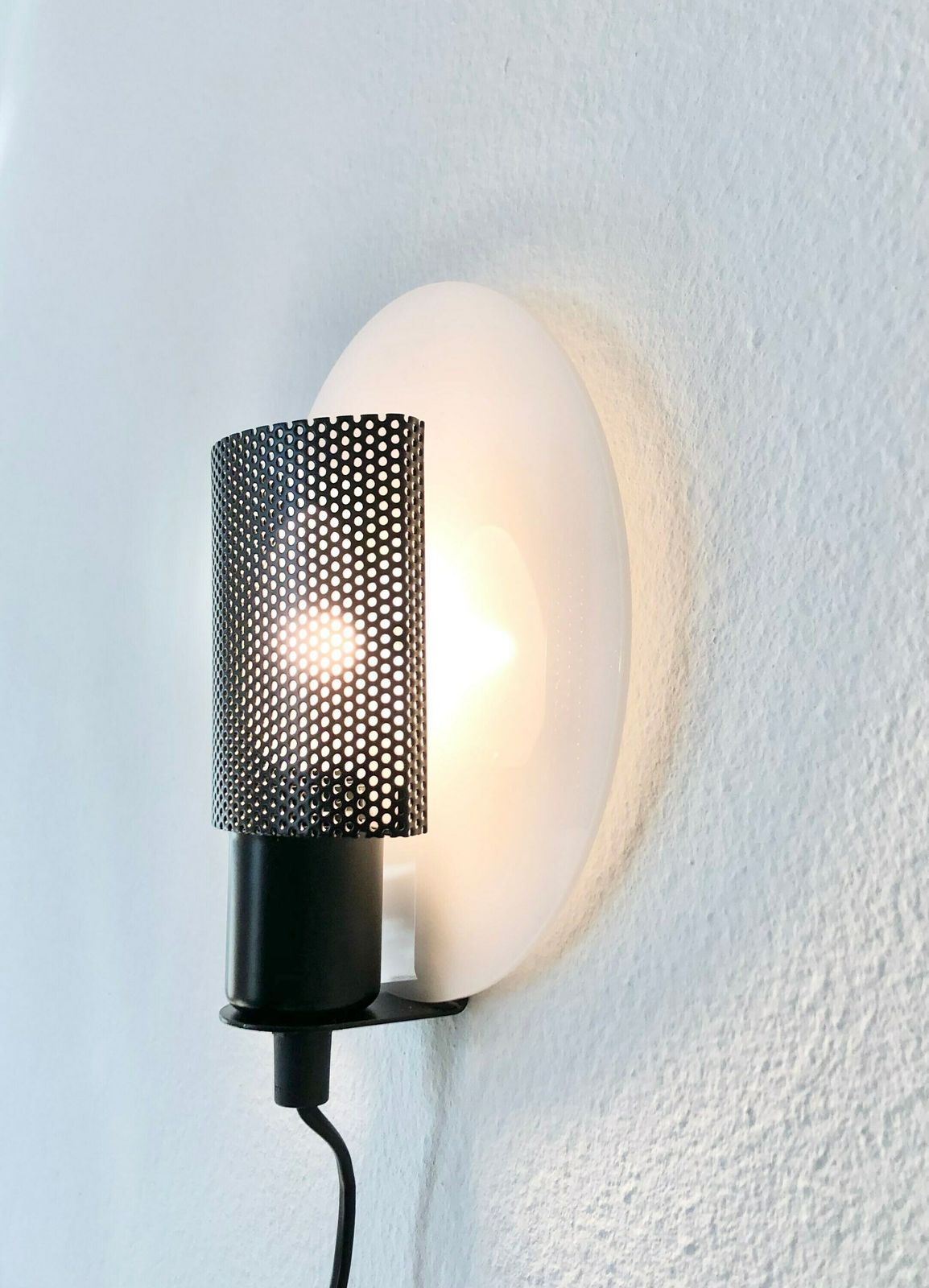 Danish Postmodern Minimalist Vintage “Centro” Cool Wall Lamp In White Acrylic With Black Perforated Metal Shade   Design By Nn, Denmark photo for sale