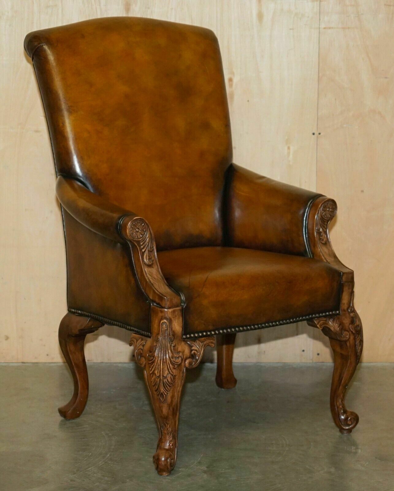 Pair Of Antique Heavily Carved Hand Dyed Brown Leather Restored Throne Armchairs photo furniture
