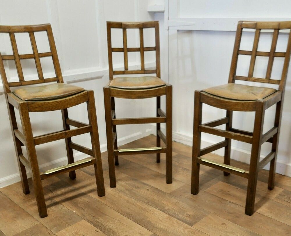 A Rare Trio Of Arts And Crafts High Bar Stools, In Golden Oak