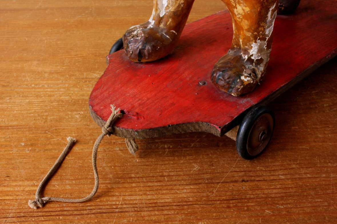 French Pull Along Lion. Paper Mache Model Animal Decorative Toy Trolley. photo vinterior