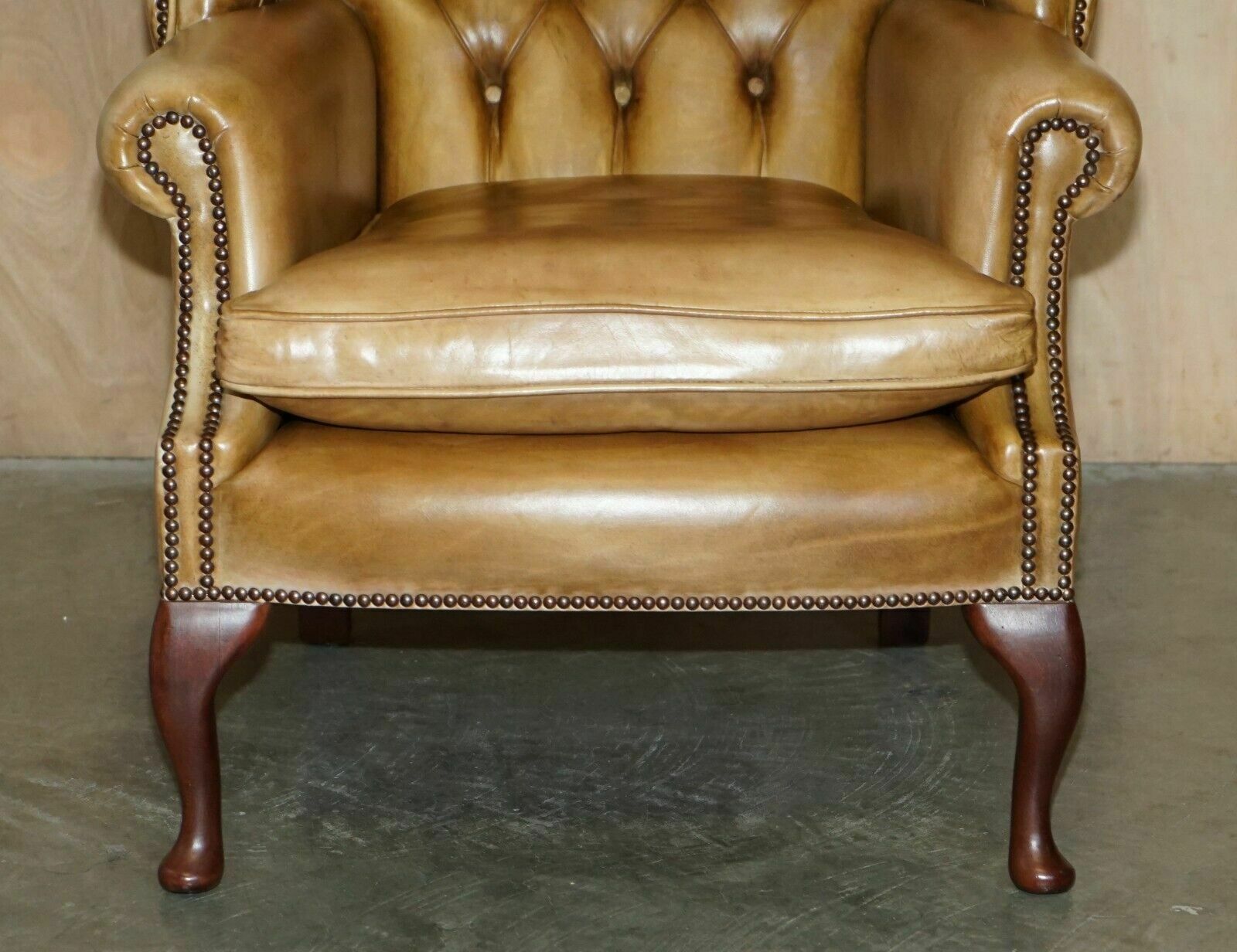 Pair Of Vintage Tan Brown Leather Chesterfield Wingback Chairs With Footstools photo vinterior