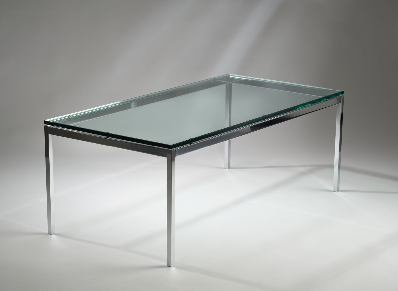 Iconic Florence Knoll For Knoll Studio Chromed Steel & Toughened Glass Coffee Table, Circa 2006. photo vinterior