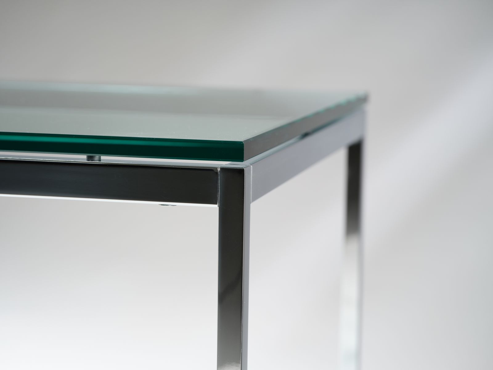 photo furniture Iconic Florence Knoll For Knoll Studio Chromed Steel & Toughened Glass Coffee Table, Circa 2006.
