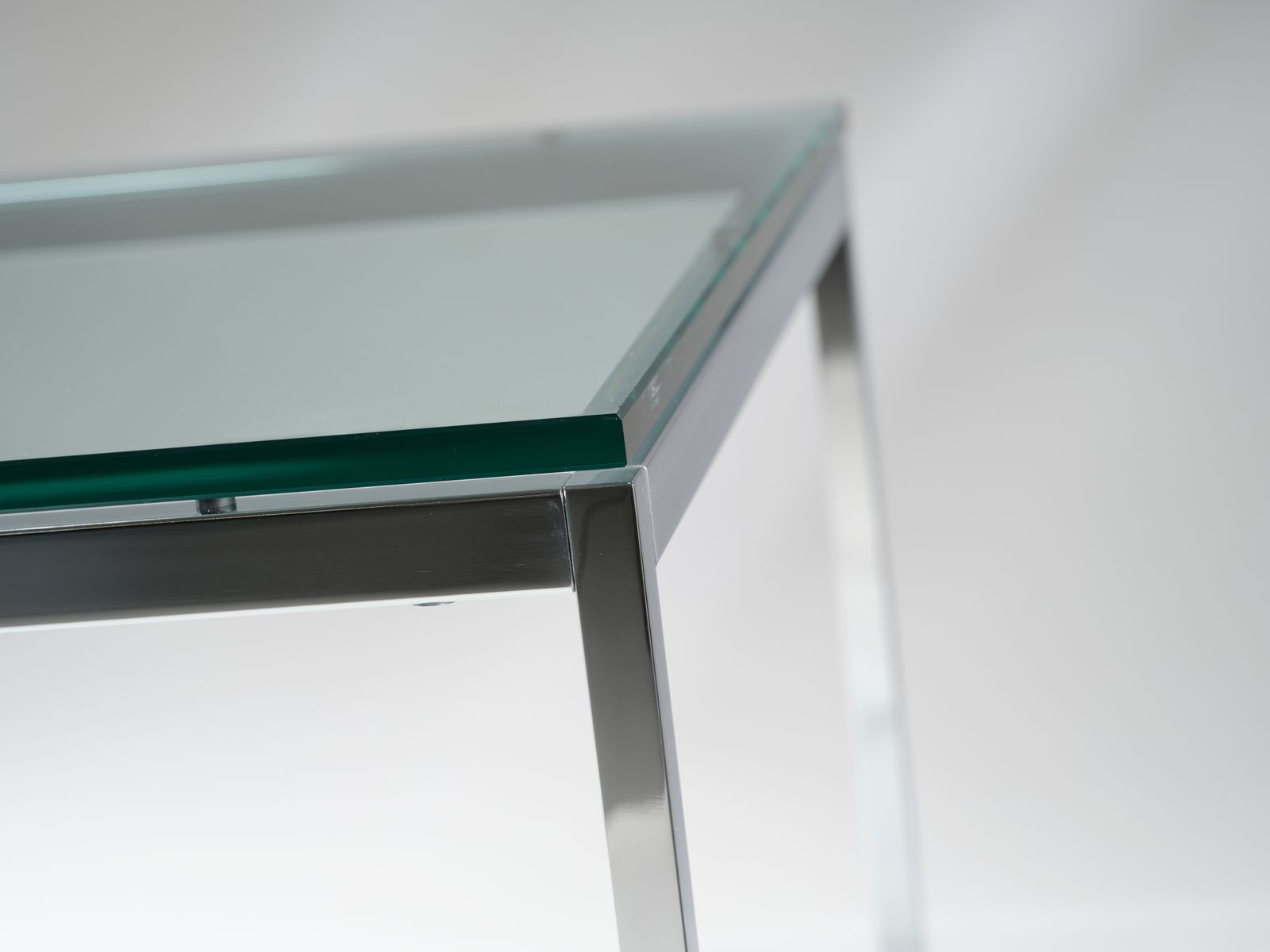 photo for sale Iconic Florence Knoll For Knoll Studio Chromed Steel & Toughened Glass Coffee Table, Circa 2006.