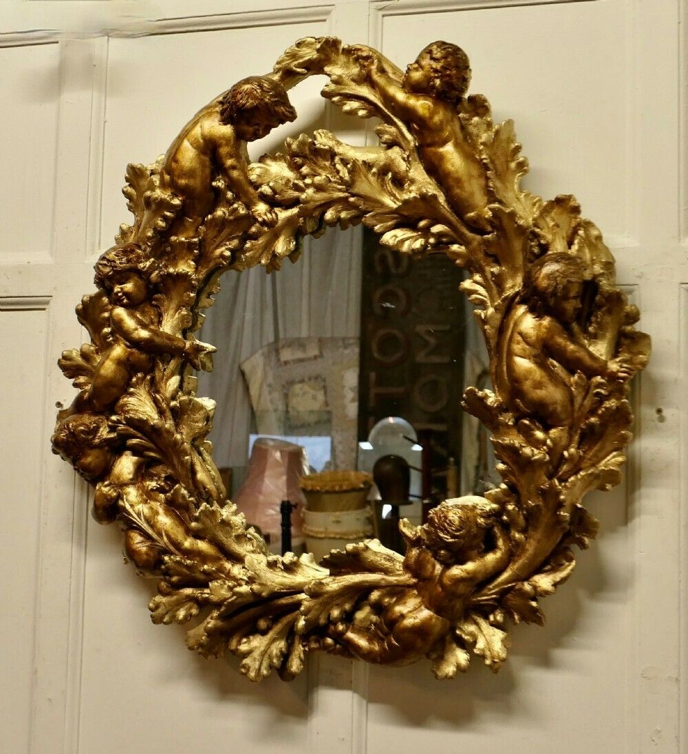 A Superb 19th Century Italian Gilt Wreath Mirror photo for sale