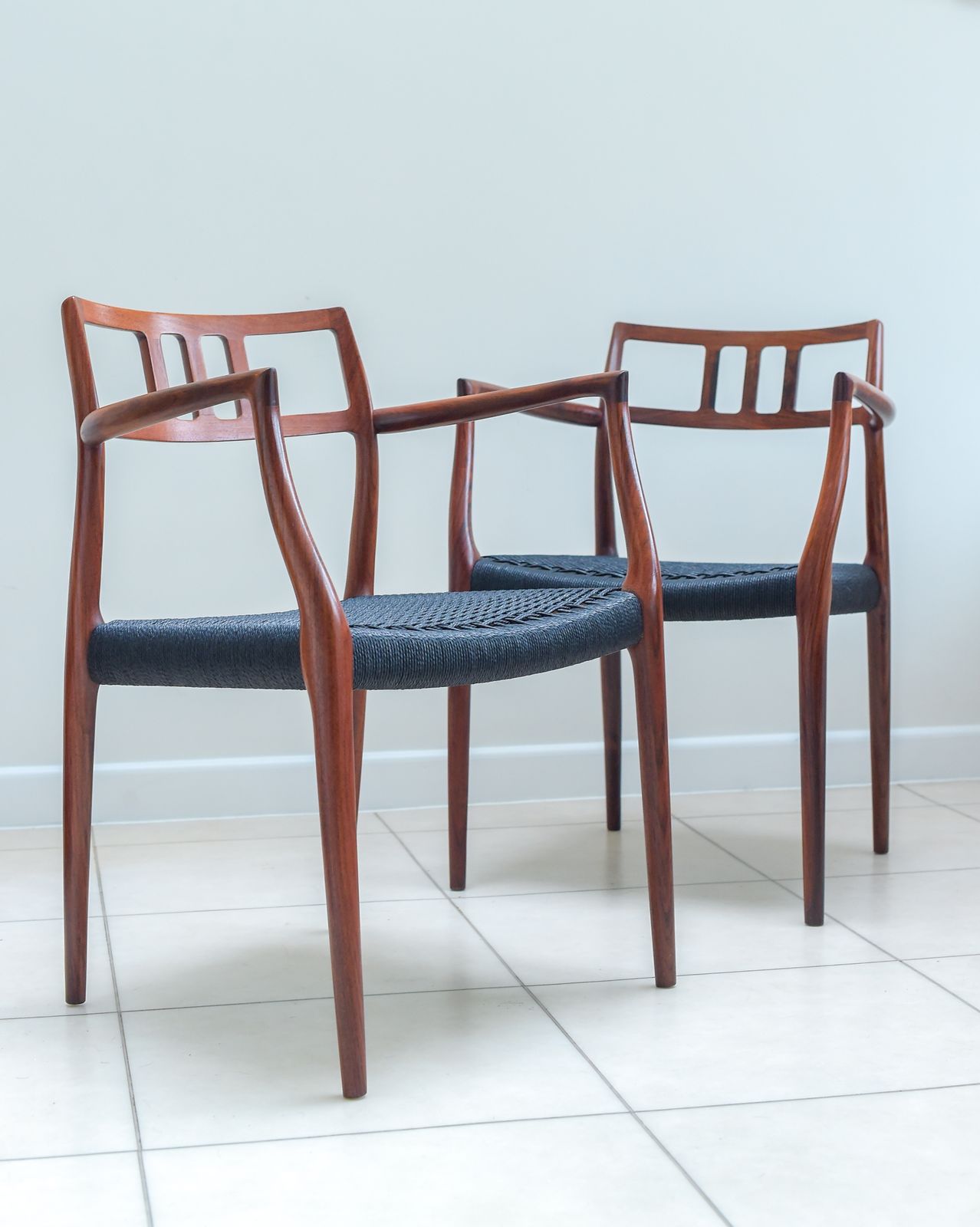 A Scarce Pair Of Niels Møller Model 64 Rosewood Carver Chairs For J L Moller, Denmark. photo buy