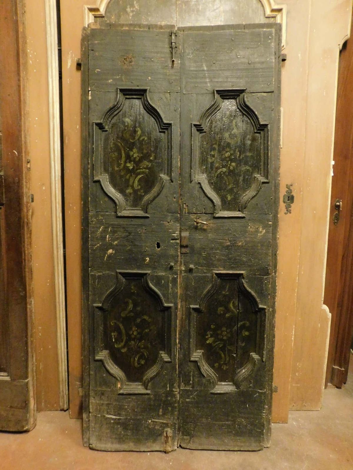 Double Door In Rustic Larch Wood, Black Background And Painted Panels, Italy photo buy