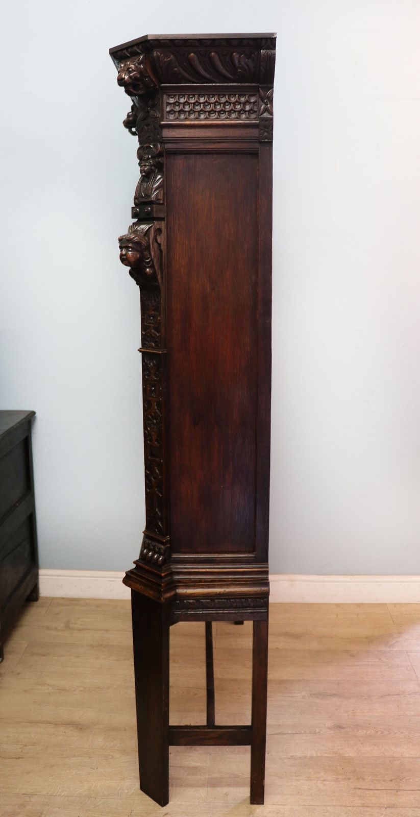A Lovely Late 19th Heavily Carved Oak Bookcase Cabinet On Stand, Later Sign Written With A Selection Of German Beer Related Emblems. photo vinterior