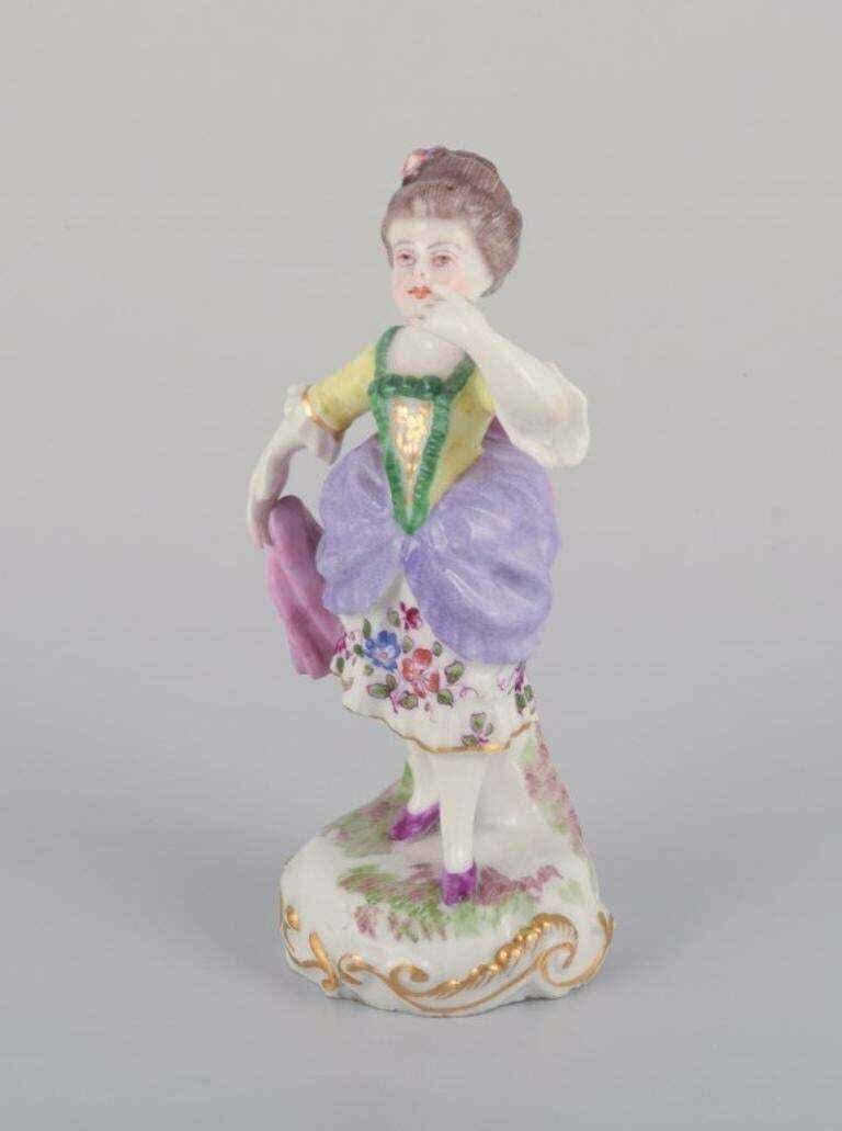 Antique German Porcelain Figurine. Young Woman In Elegant Attire. photo furniture