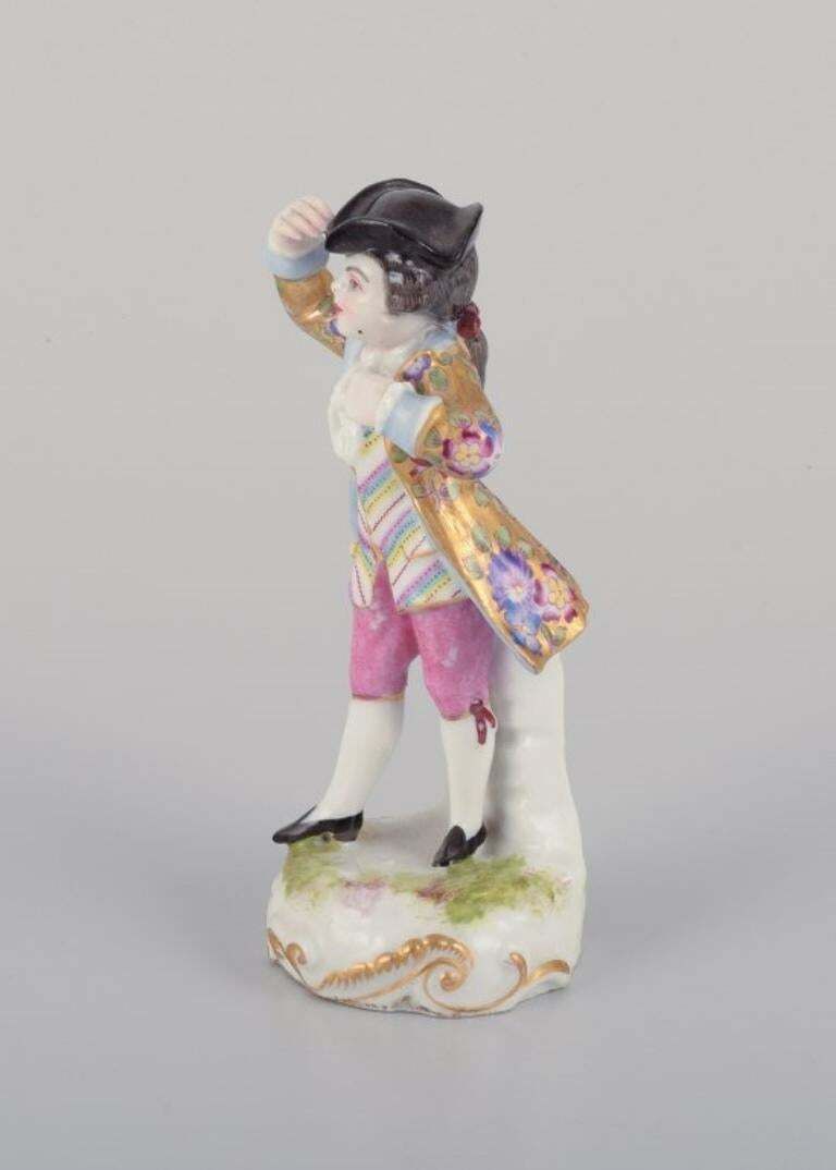 Meissen, Germany. Porcelain Figurine Of Young Man In Elegant Attire. photo for sale
