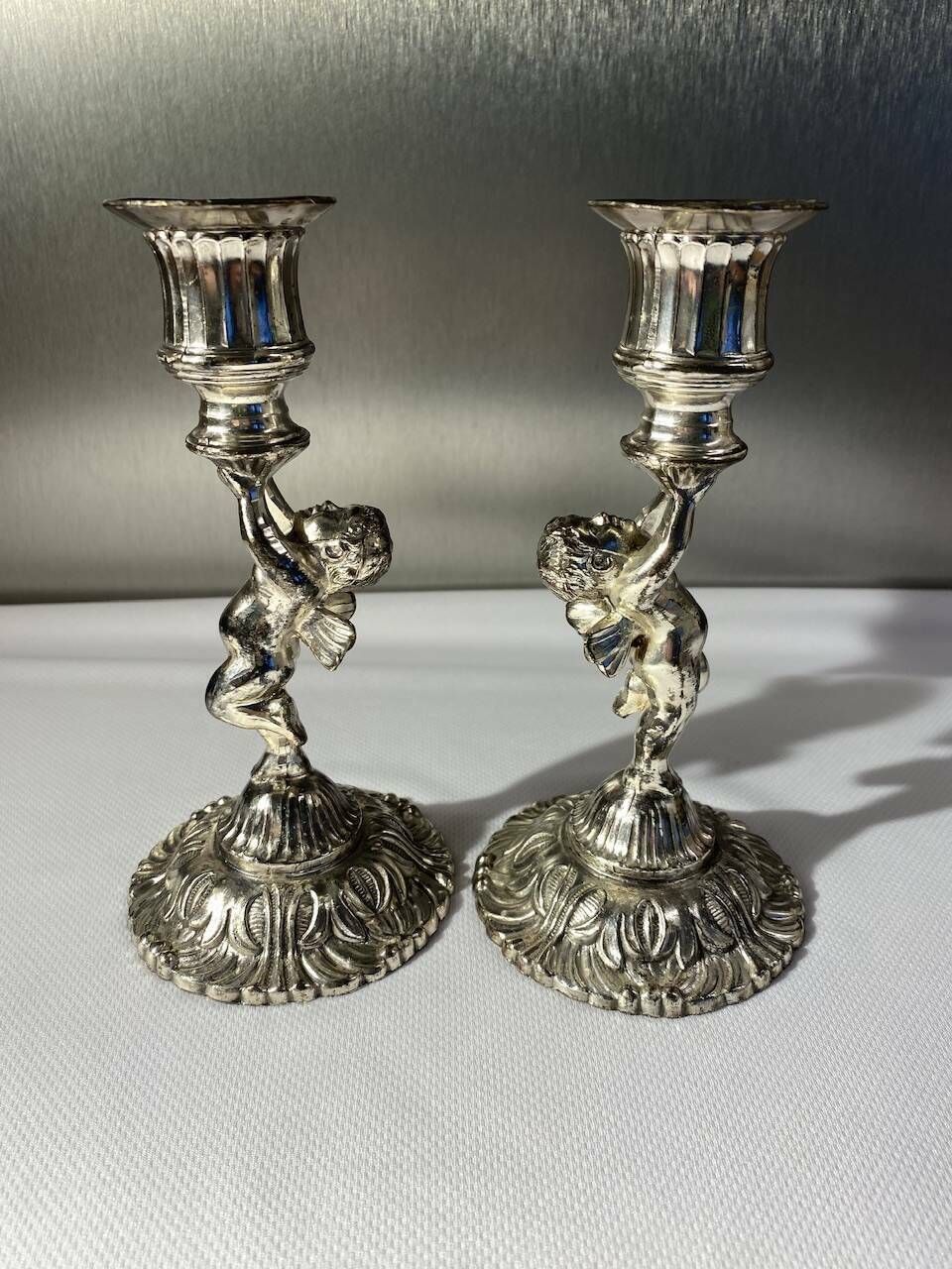 Two Silver Metal Candlesticks Decorated With 20th Century Cherubs photo Home Decor