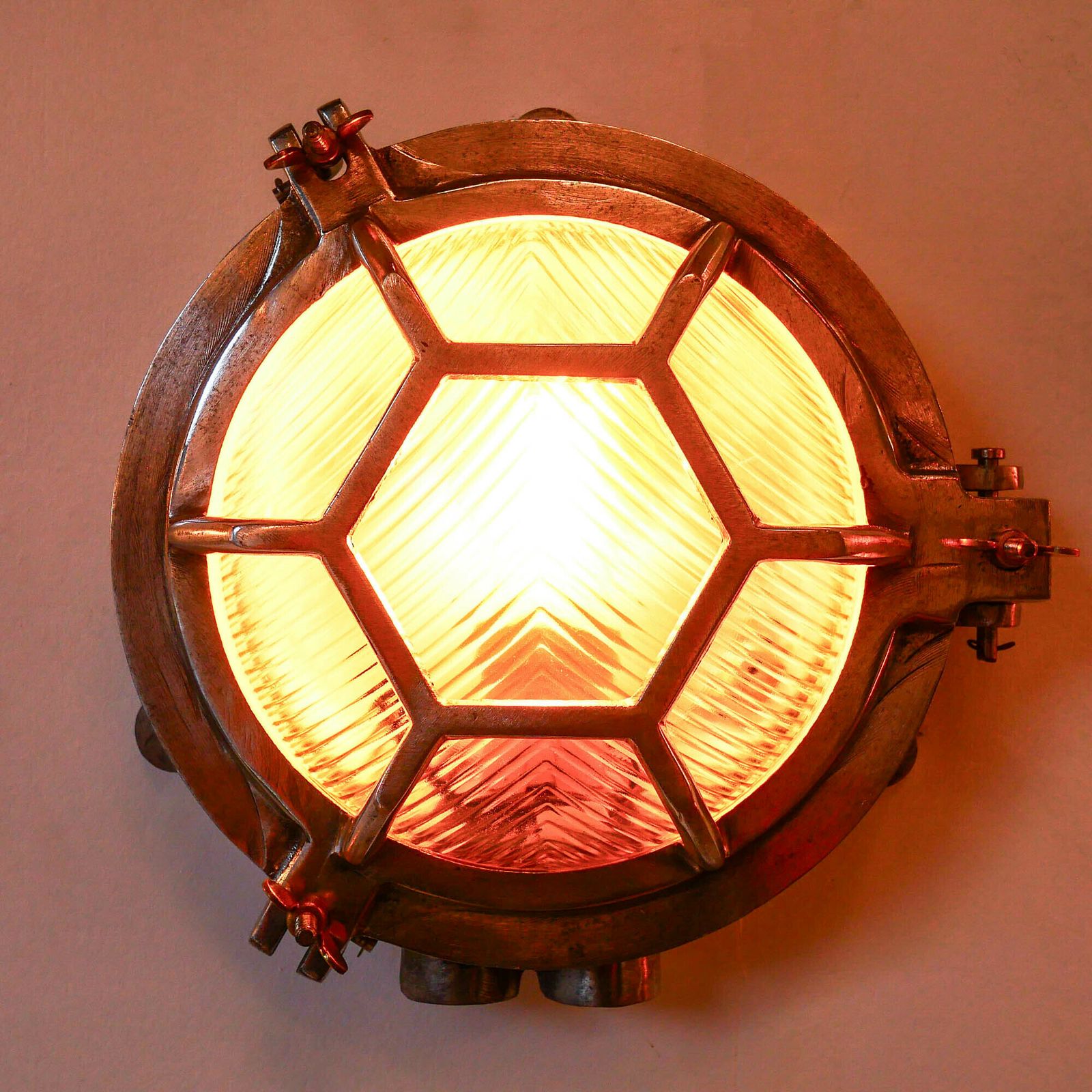Old Cast Aluminum Wall Light With Hexagonal Grid And Wide Streaked Glass. photo furniture