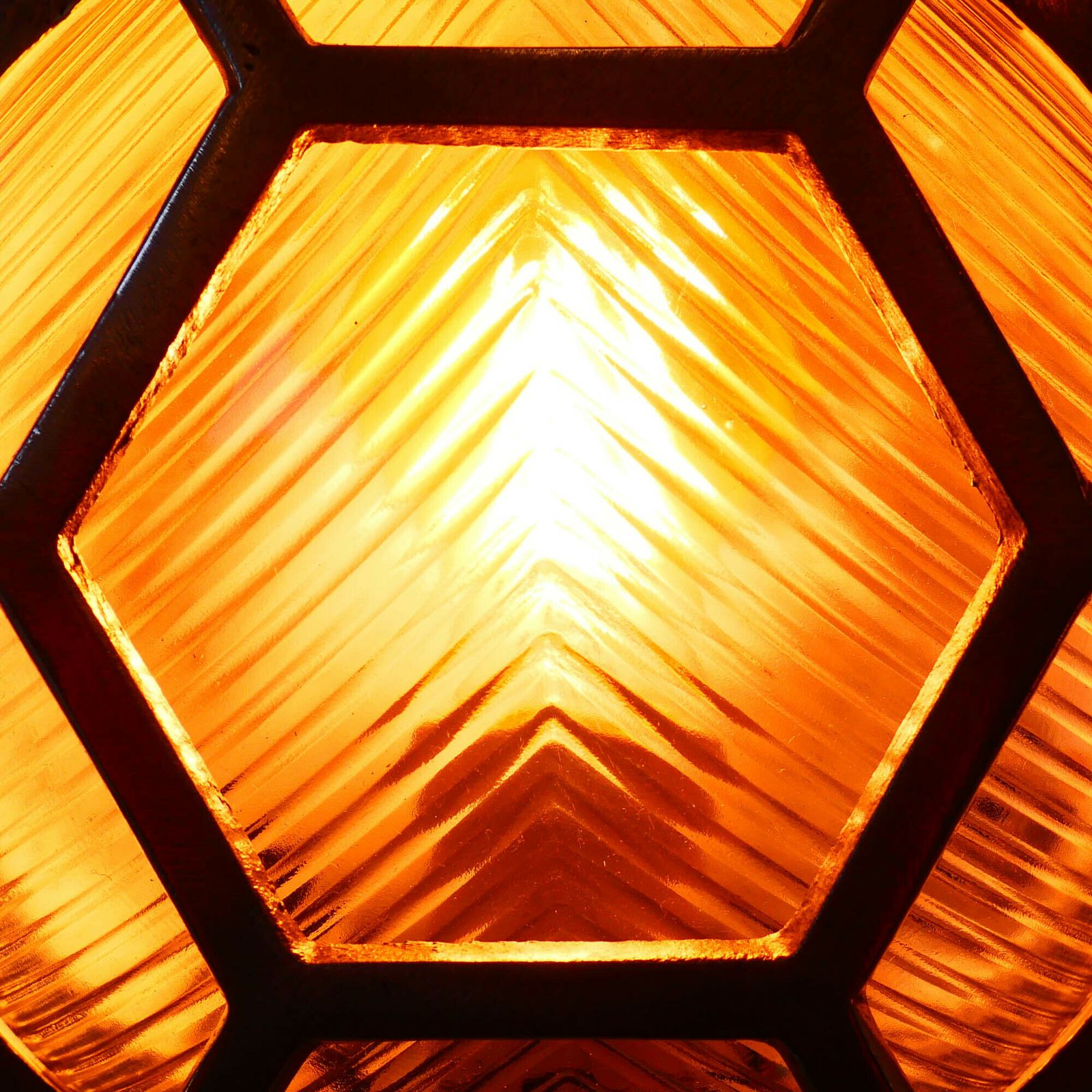 Old Cast Aluminum Wall Light With Hexagonal Grid And Wide Streaked Glass. photo vinterior