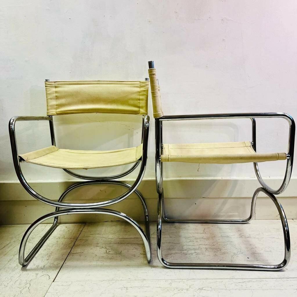 A Pair Of Mid Century Cream Leather And Chrome Chairs Dining Chairs photo vinterior