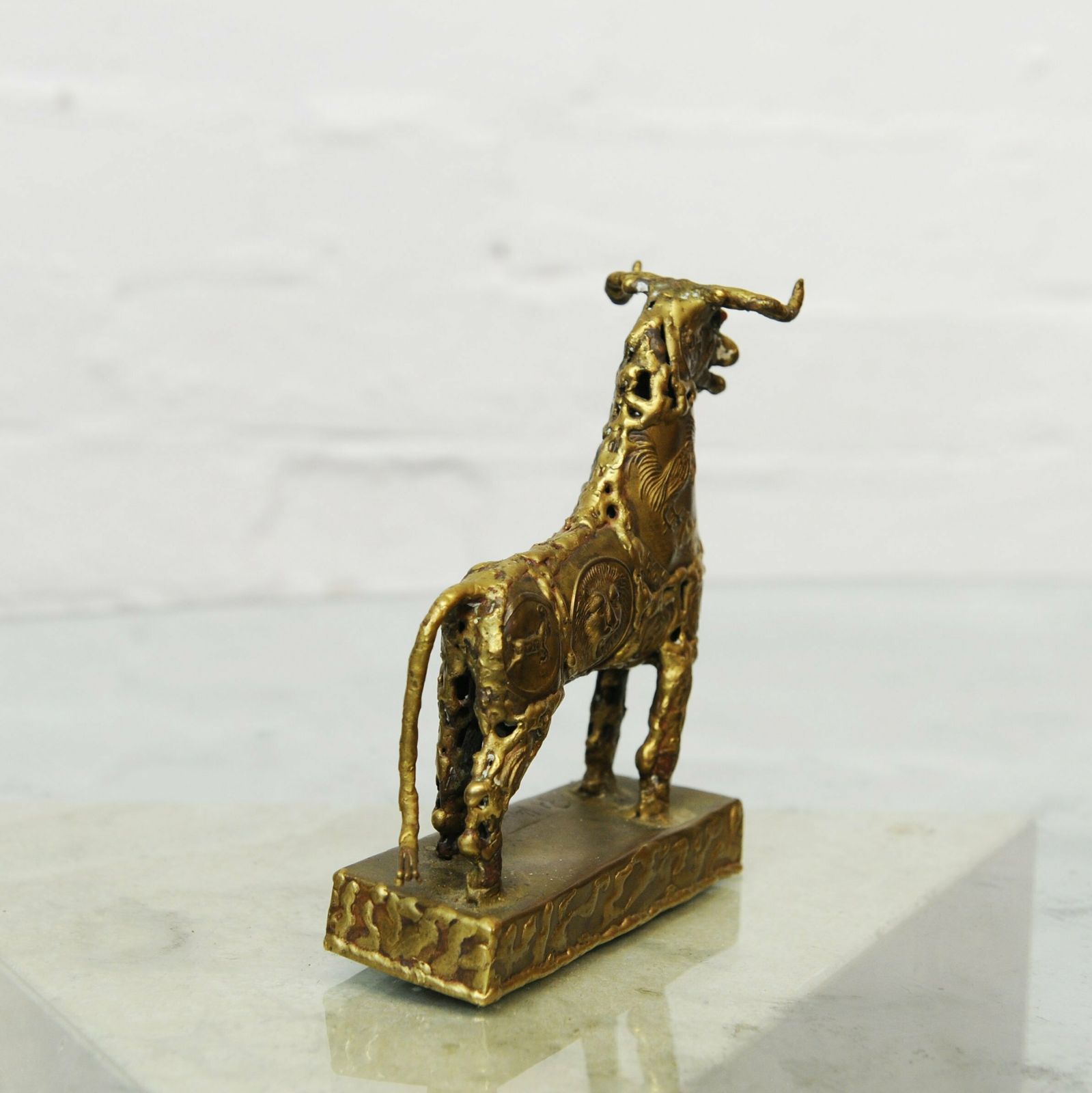 Brutalist Metal Sculpture Of A Brass Bull By Pal Kepenyes, 1970s photo vintage