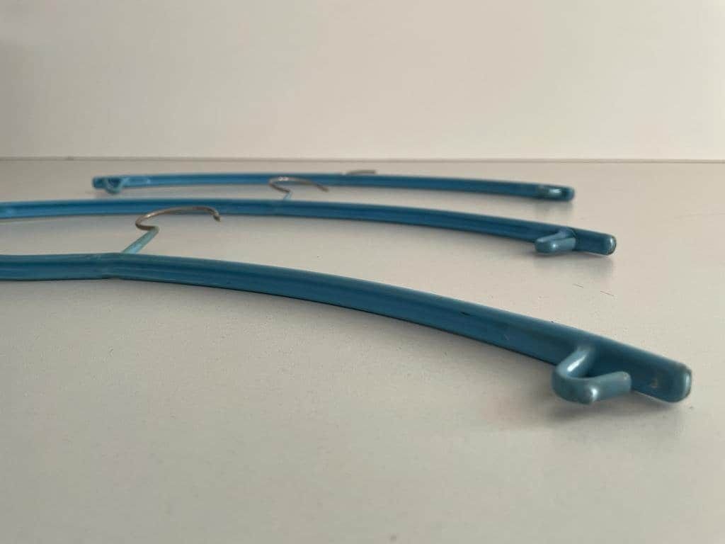 photo for sale Set Of 6 Blue/Yellow/Pink/Red Metal Italian Clothes Hangers