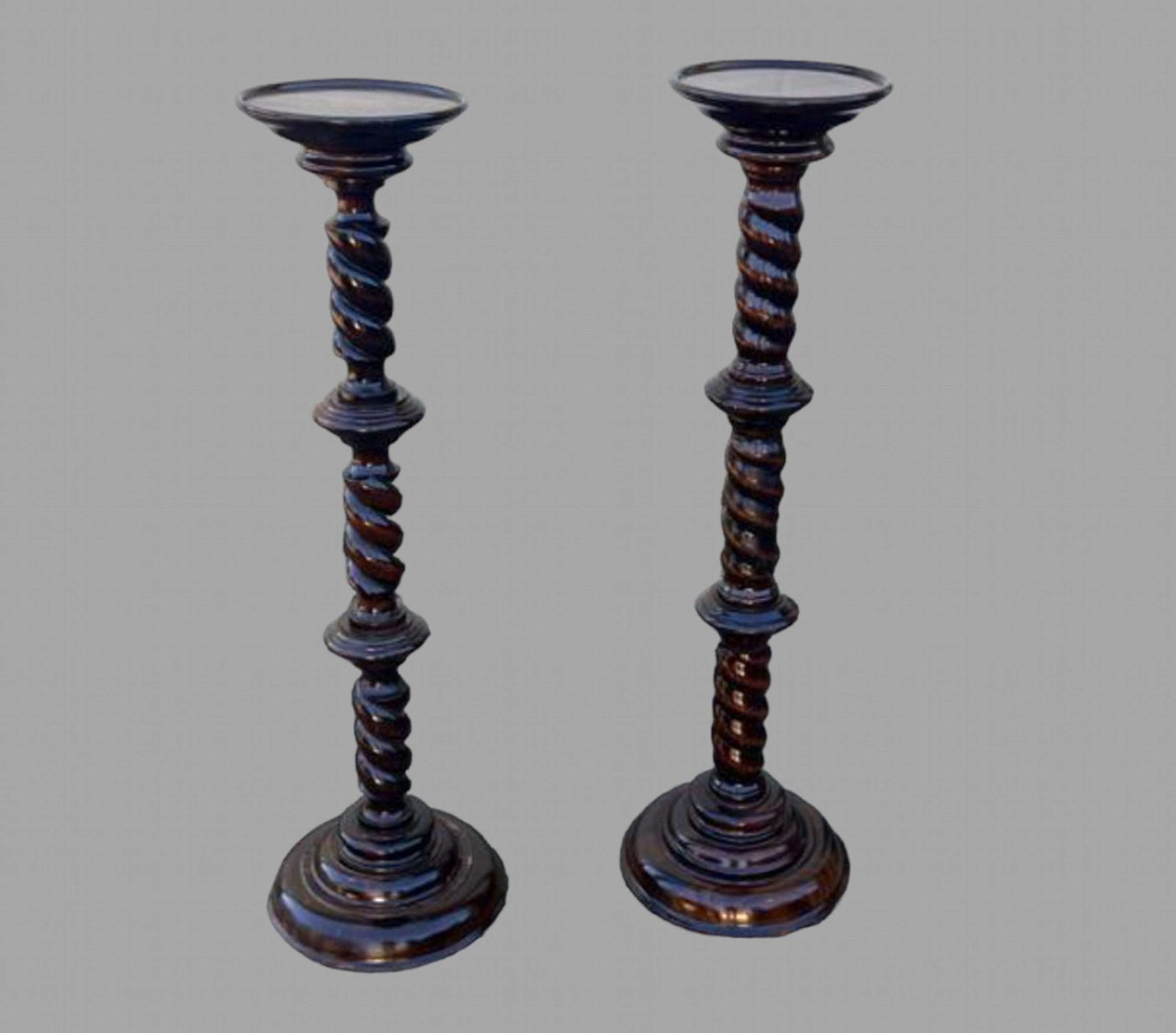 A Near Pair Of Hardwood Torchiere/Plant Stands