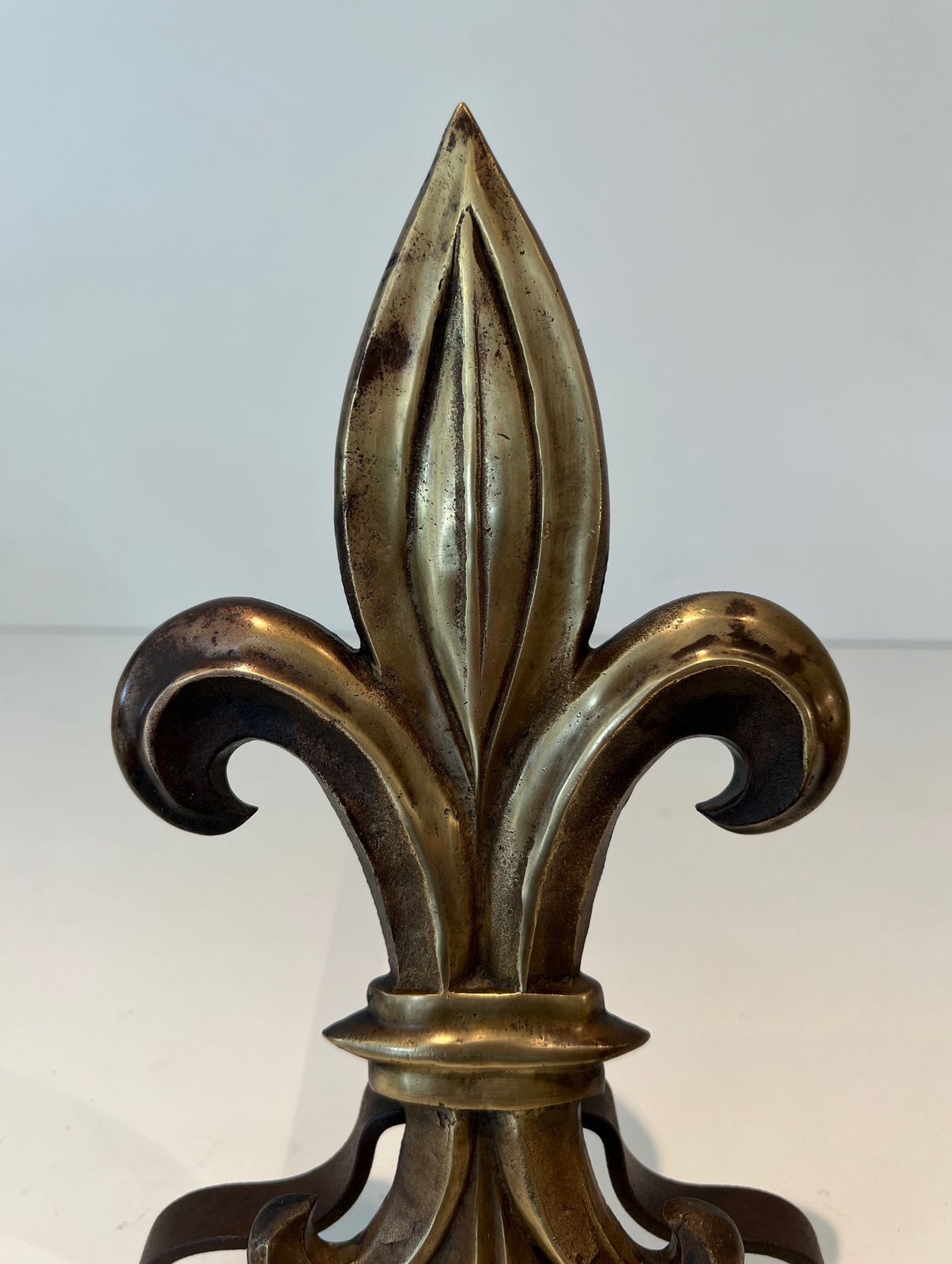 photo furniture Pair Of Bronze And Wrought Iron Andirons Representing A Fleurs De Lys