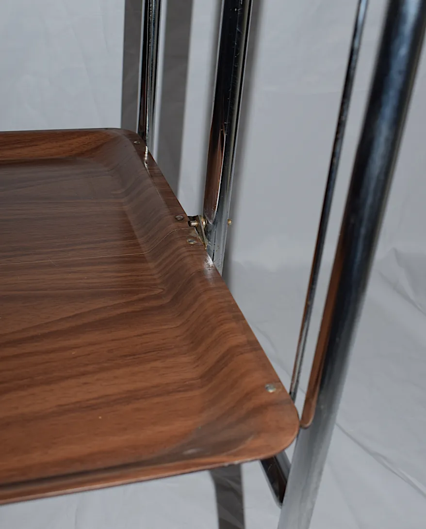A Mid Century Bremshey & Co German Dinette Trolley. Made Of Chrome & Lamented Wood. It Folds Into A Smaller Frame. Attribution Mark On The Wheels. photo vintage