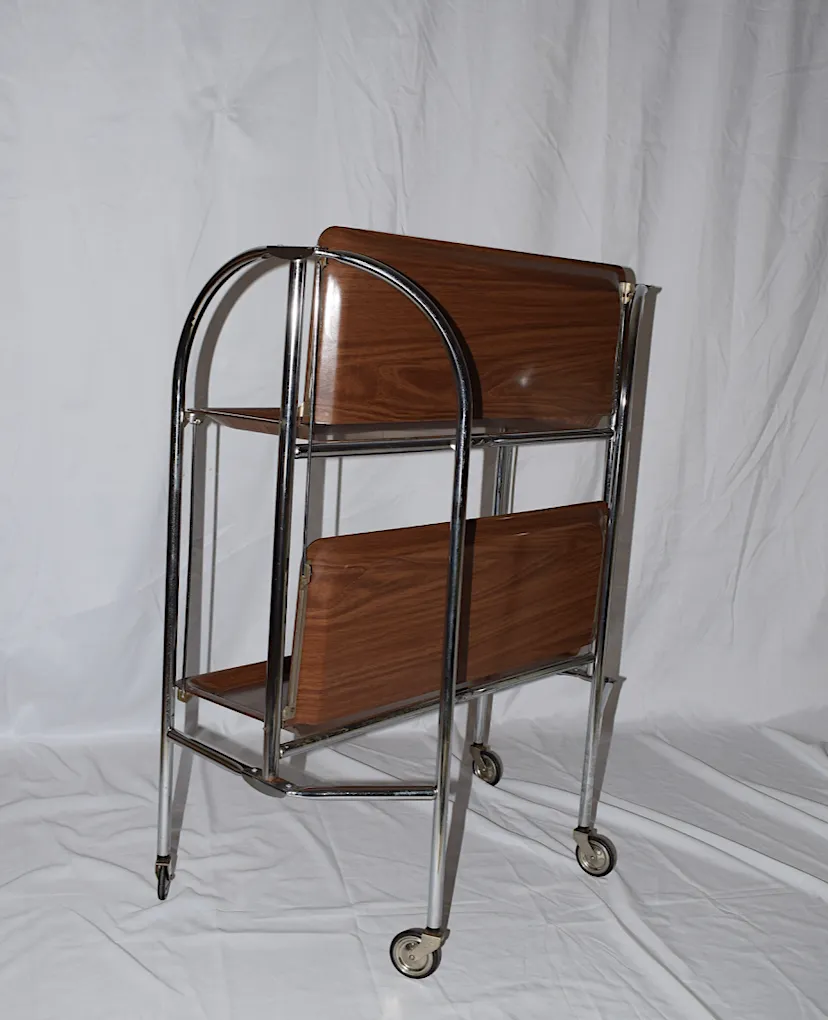 190.0 A Mid Century Bremshey & Co German Dinette Trolley. Made Of Chrome & Lamented Wood. It Folds Into A Smaller Frame. Attribution Mark On The Wheels. photo