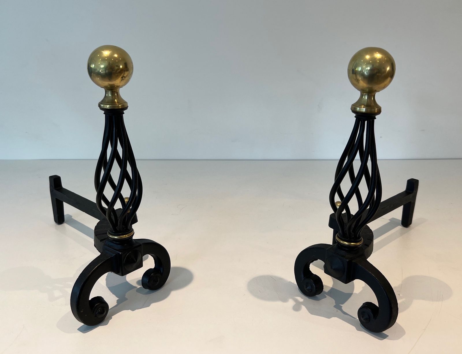 Pair Of Wrought Iron Andirons Topped With A Brass Ball photo for sale