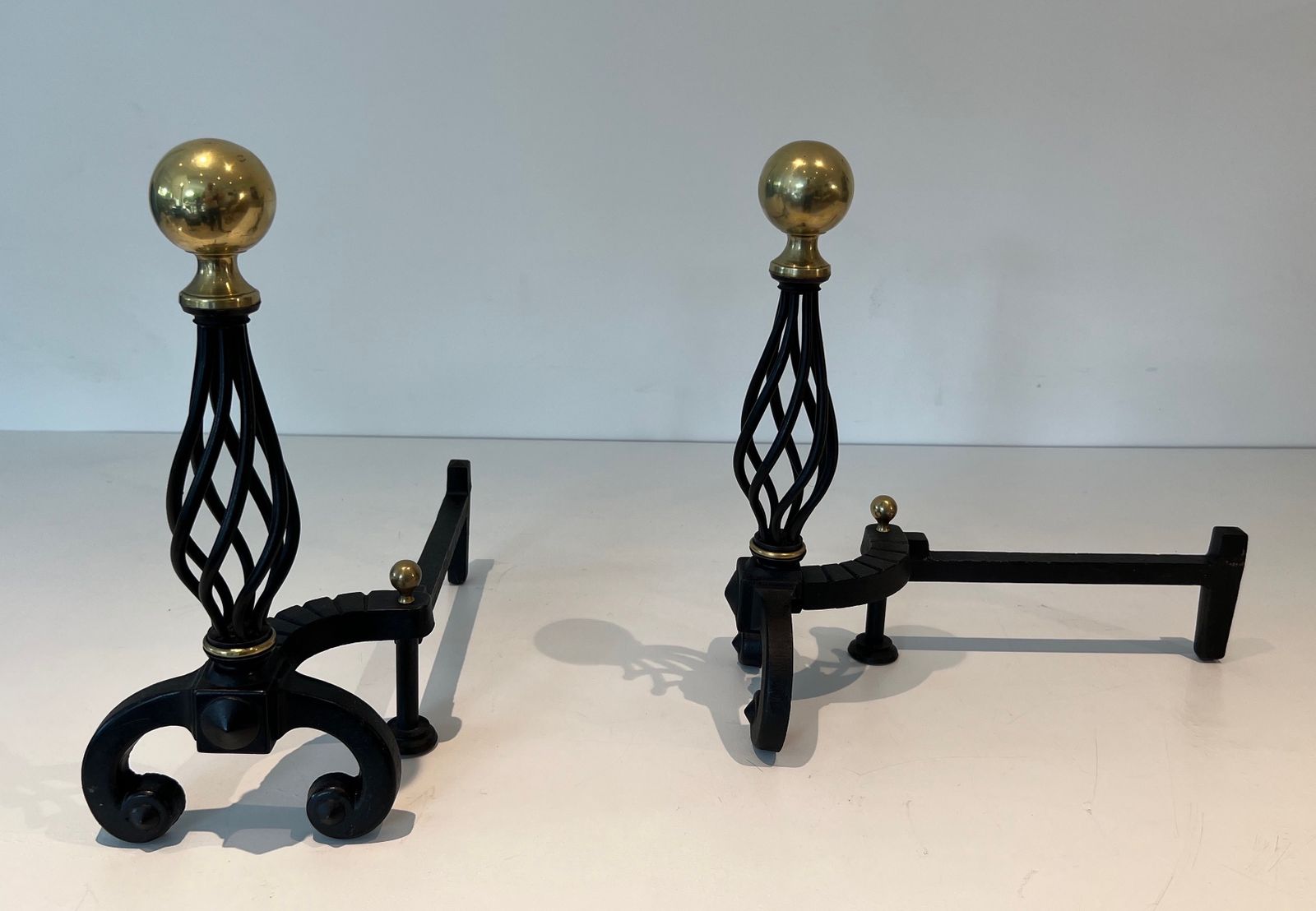 Pair Of Wrought Iron Andirons Topped With A Brass Ball photo Home Fixtures