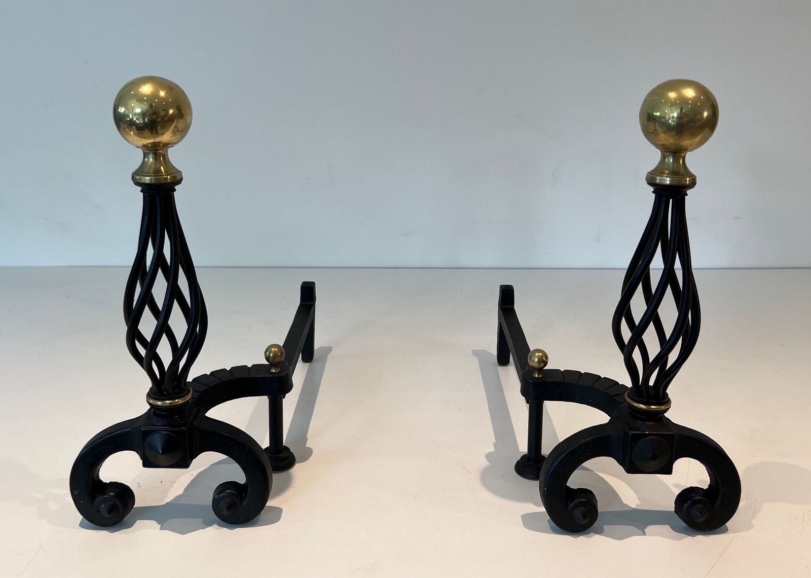 980.0 Pair Of Wrought Iron Andirons Topped With A Brass Ball photo