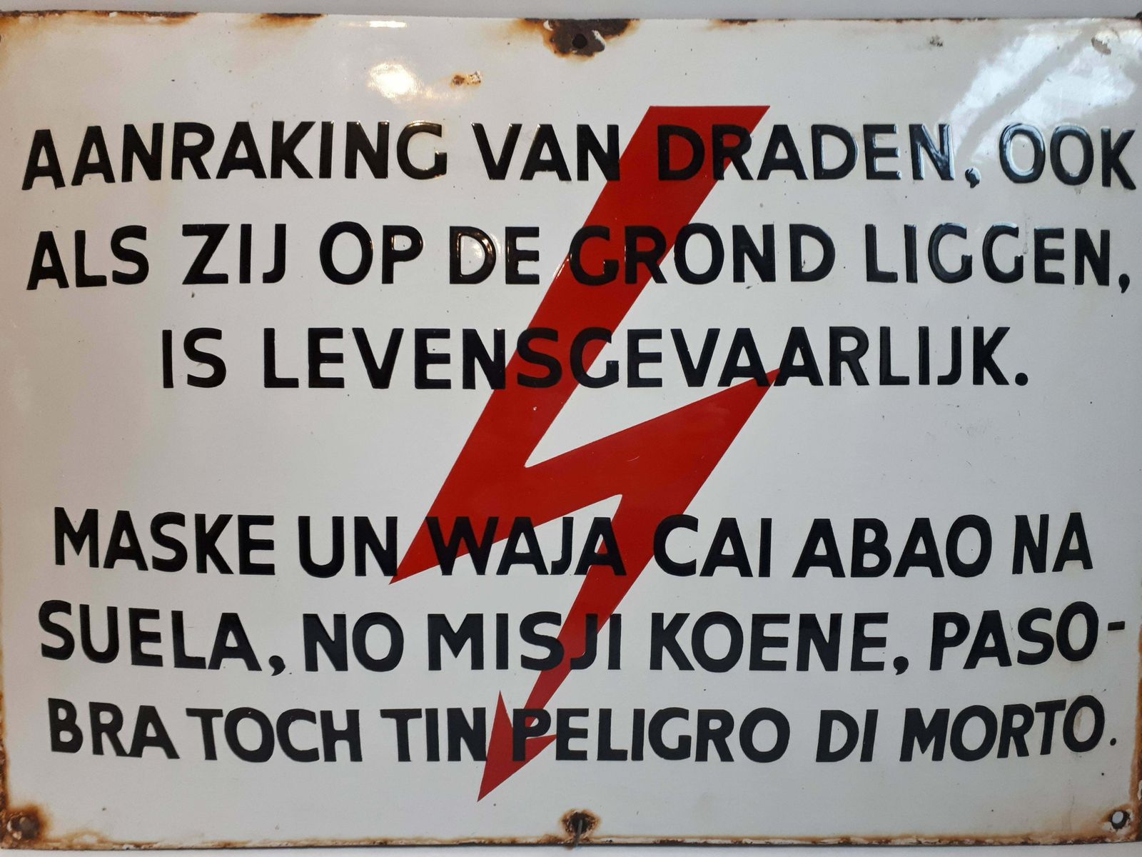 Enamel Warning Sign In Dutch And Papiamentu / Papiamento Language photo furniture
