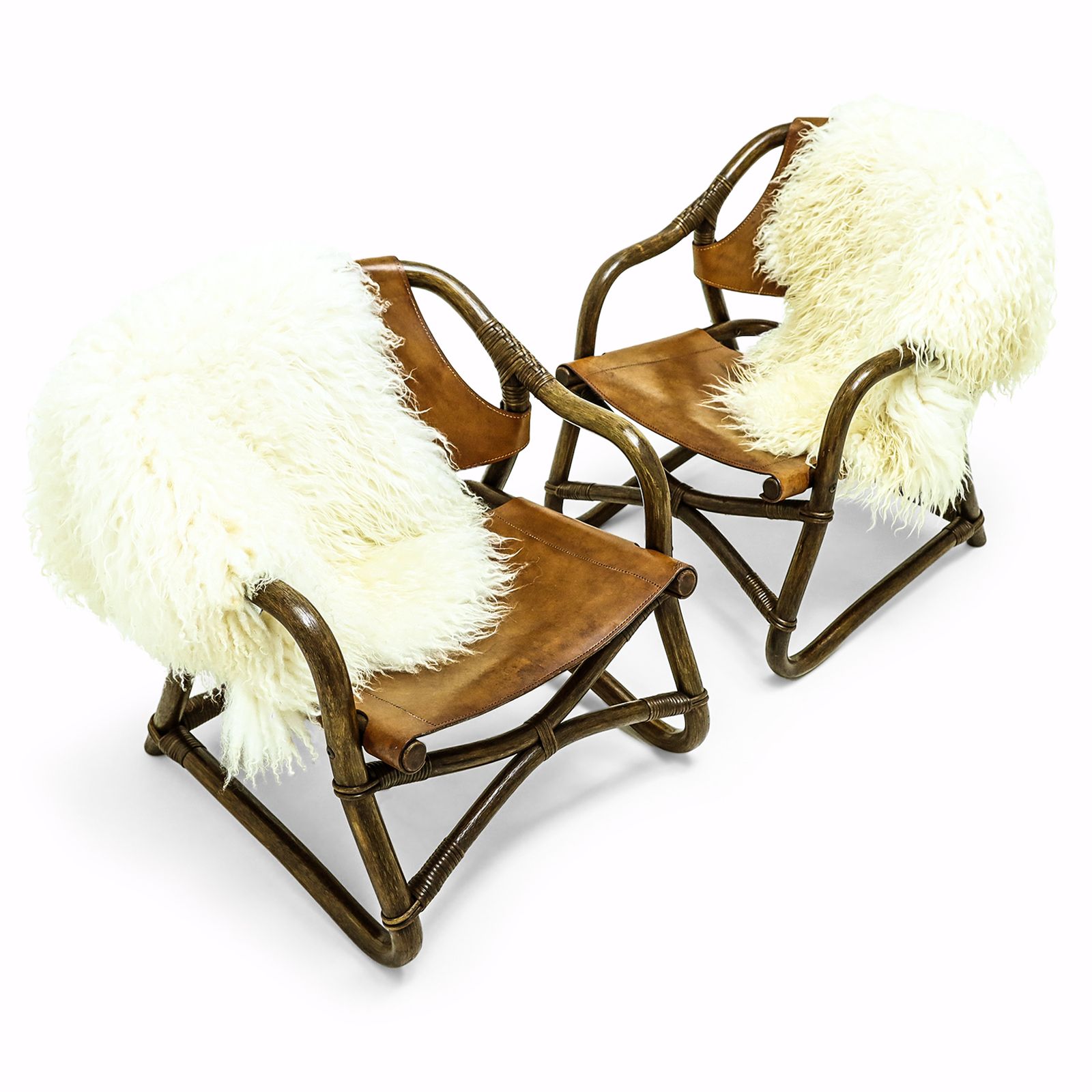 A Pair Of Vintage Sheepskin And Leather And Cane Easy Chairs Attributed To Rohe Noordwolde photo furniture