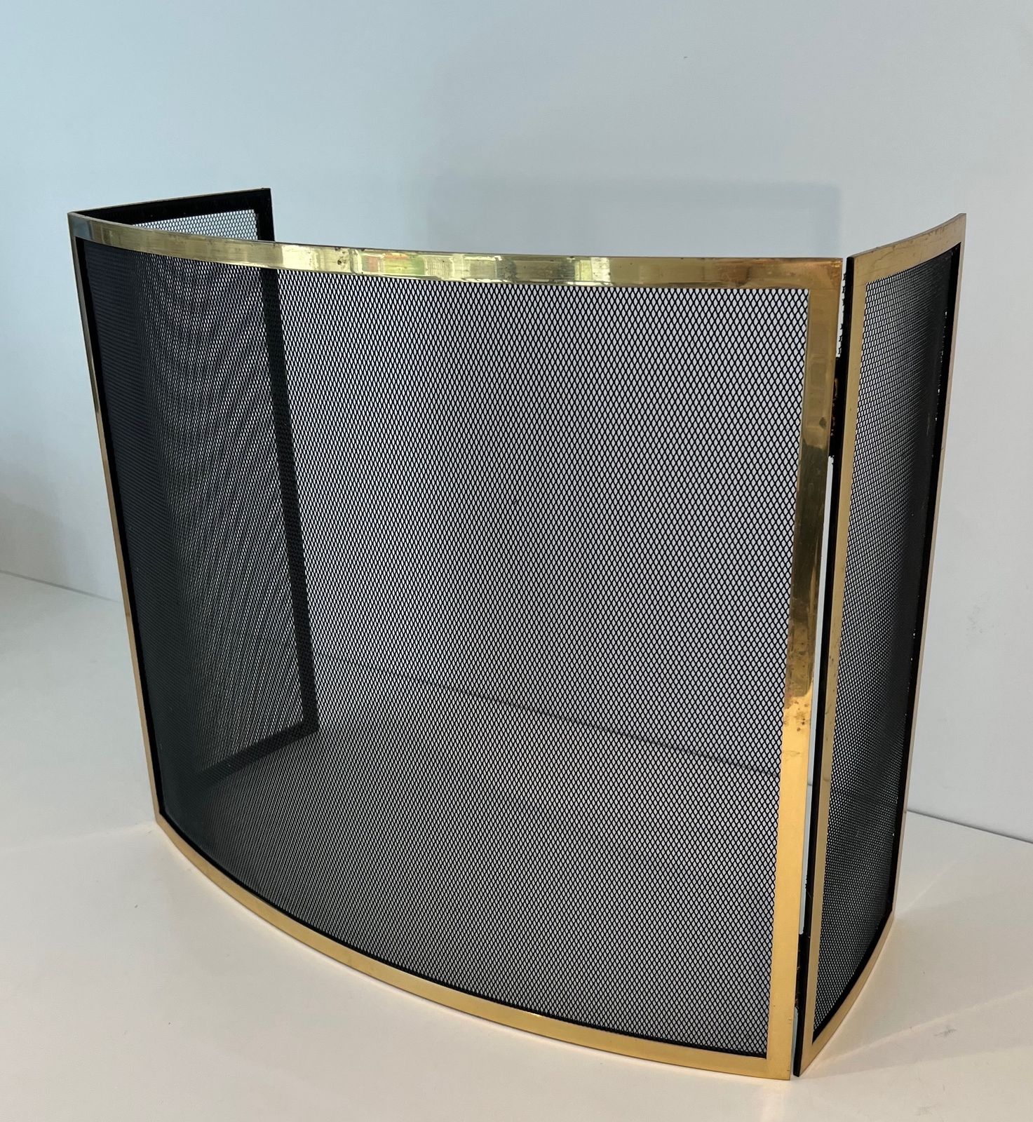 Curved Brass Firewall And Wire Mesh photo vinterior