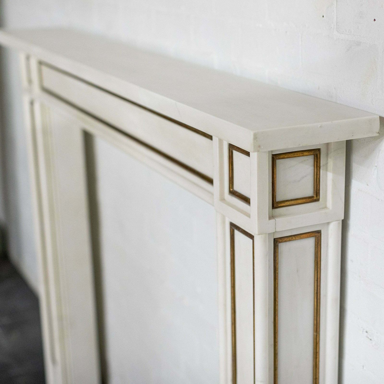 photo for sale Reclaimed Statuary Marble Fireplace Surround With Brass Detail