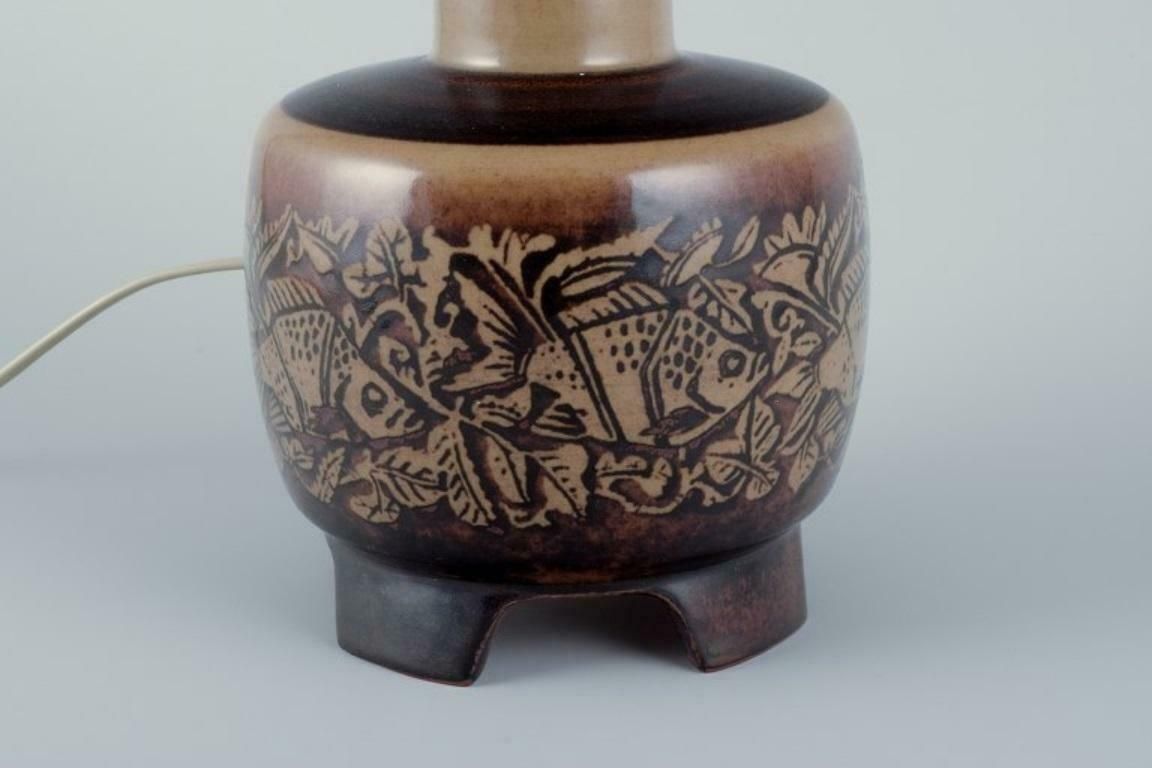 Nils Thorsson For Royal Copenhagen. Table Lamp In Stoneware With A Motif Of Fish photo vinterior