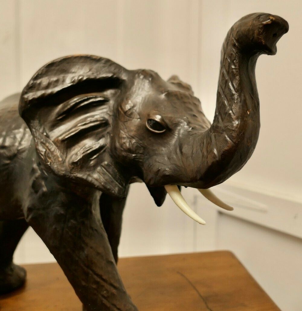 Arts And Crafts Leather Model Of An Elephant photo furniture