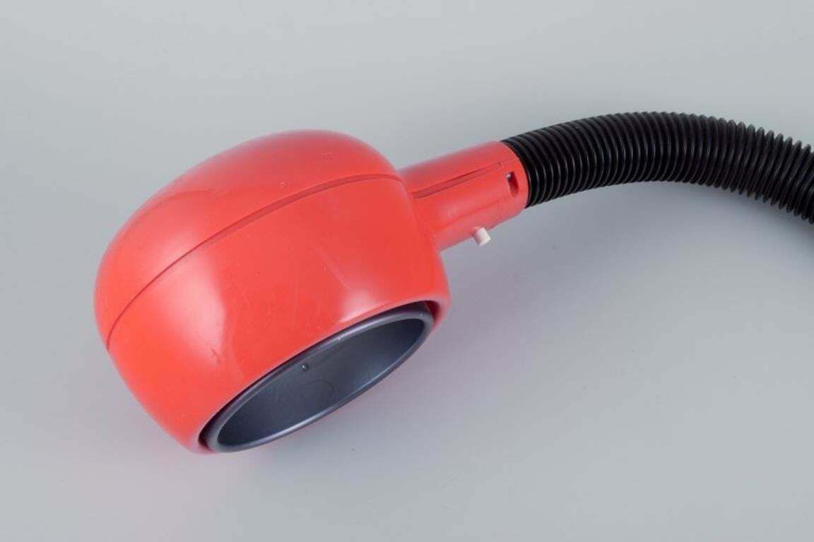 Fagerhults, Sweden. Retro Designer Desk Lamp In Orange Plastic. photo furniture