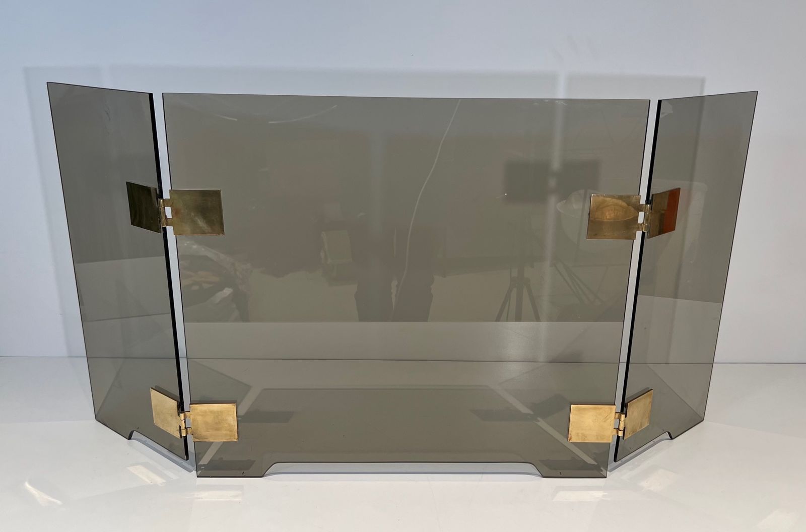 Tri Fold Firewall In Smoked Glass And Brass. Around 1970 photo furniture