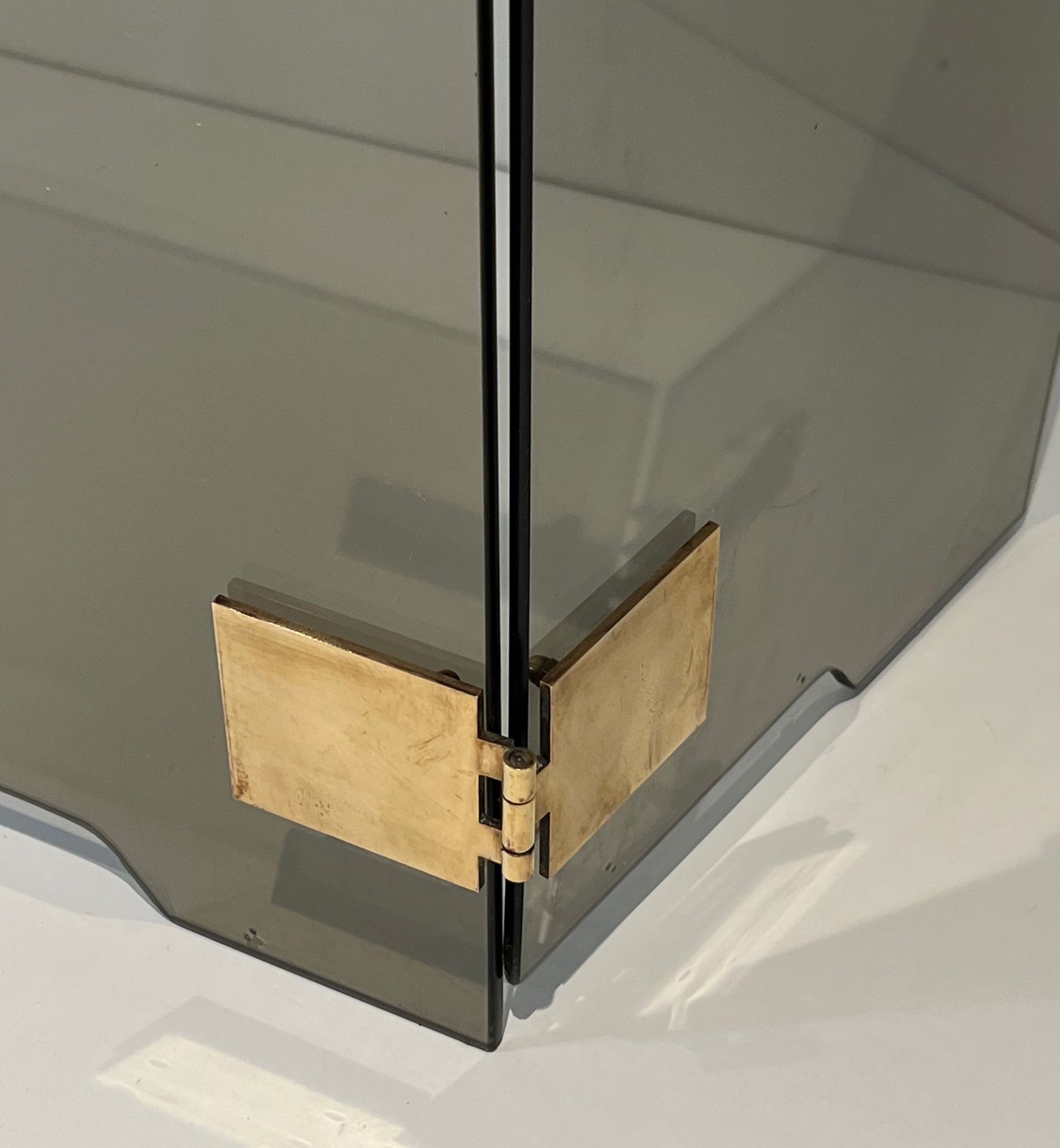 Home Fixtures Tri Fold Firewall In Smoked Glass And Brass. Around 1970 photo
