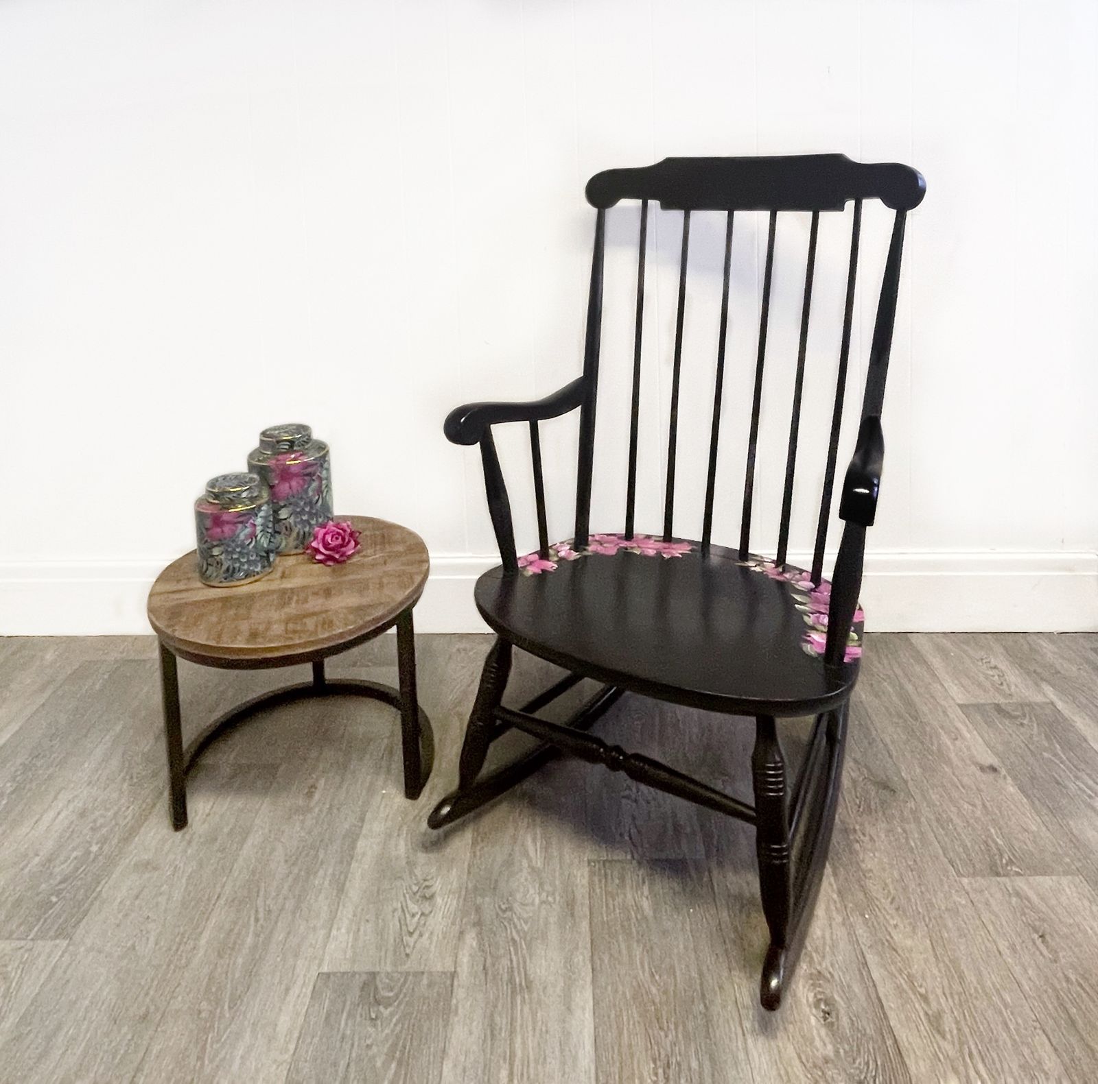 Black Wheel Back Rocking Chair With Pink Flower Design